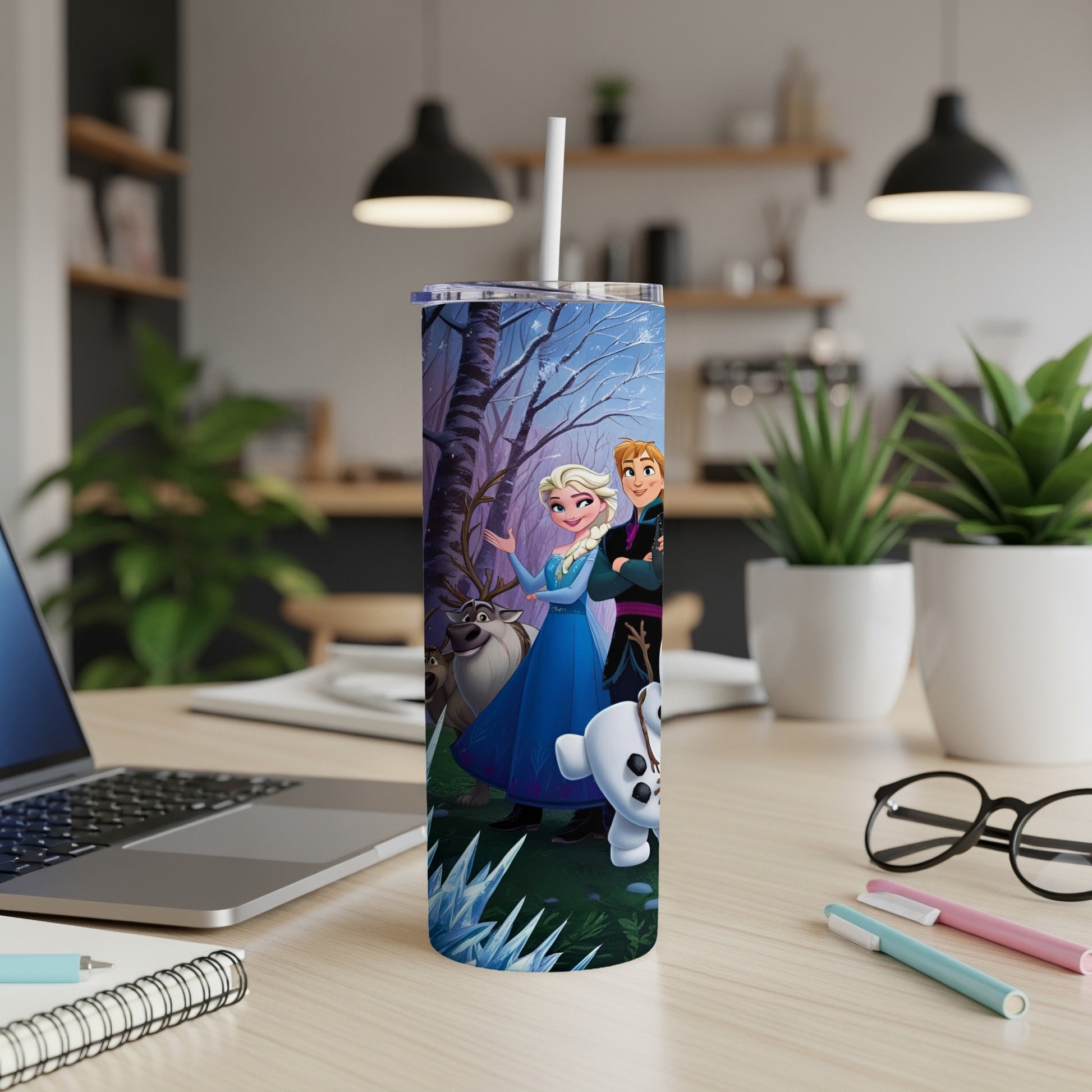 Elsa, Anna, Olaf, and Sven from Frozen on a blue speckled tumbler.