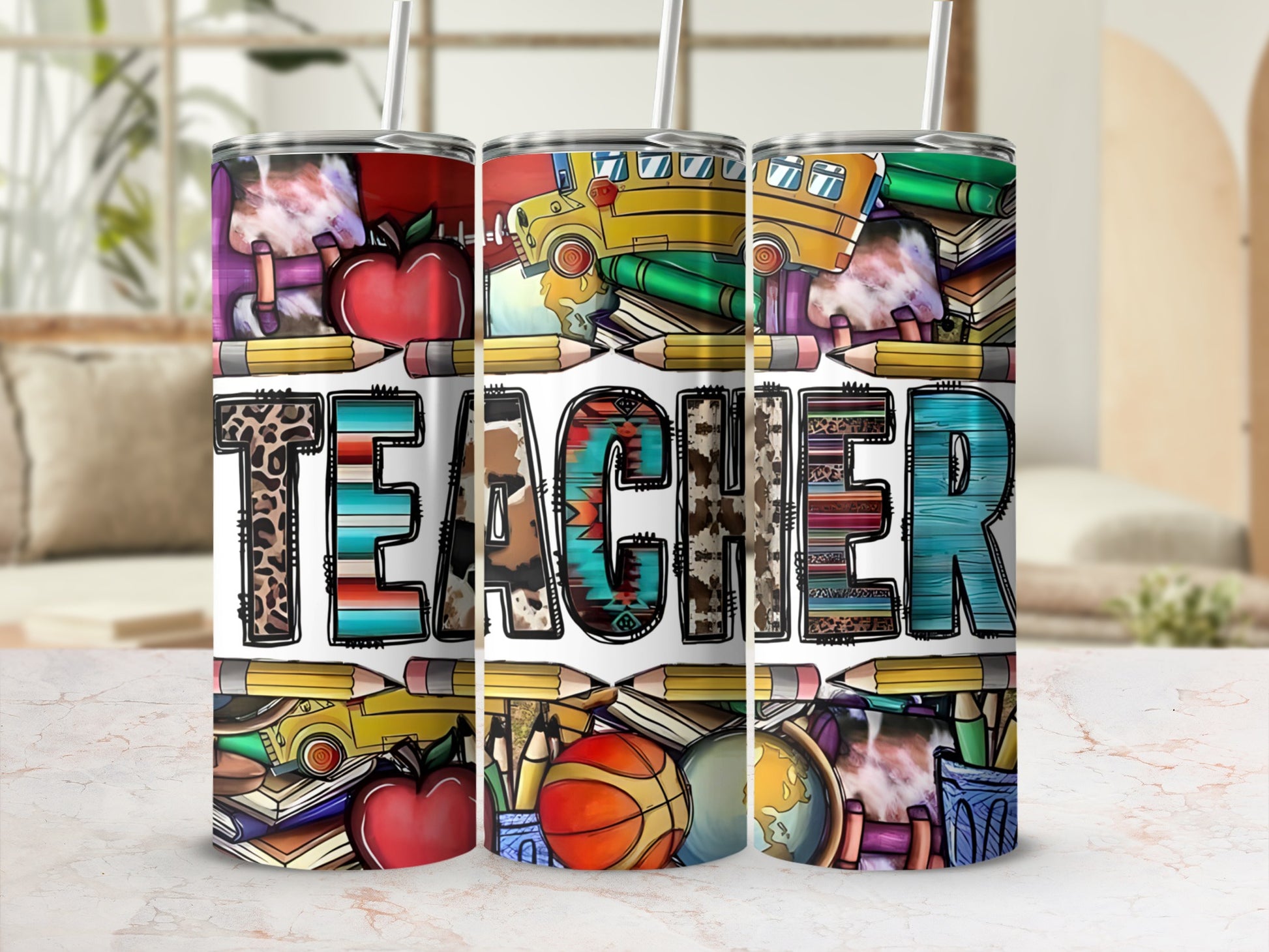 Teacher tumbler with colorful school supplies and apple pattern.