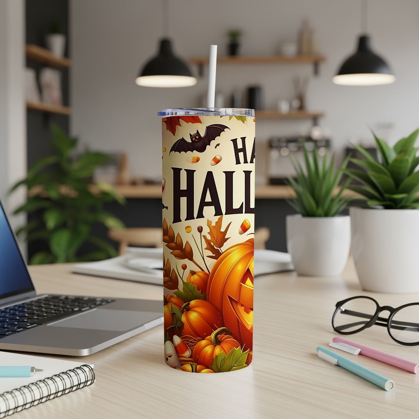 Halloween tumbler with pumpkins, bat, candy corn, and "Happy Halloween" text.