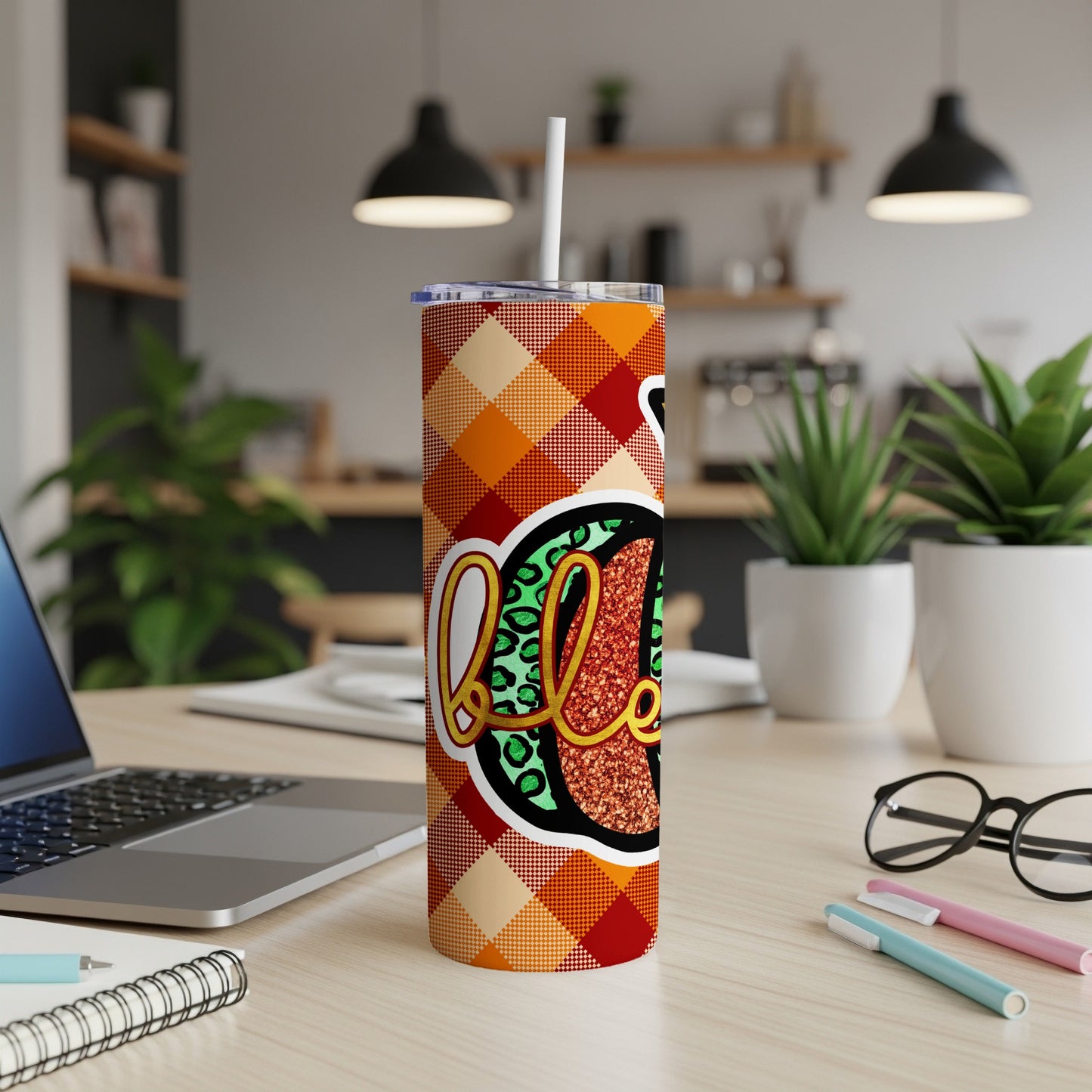 Orange plaid tumbler with "Blessed" in leopard print and glitter.