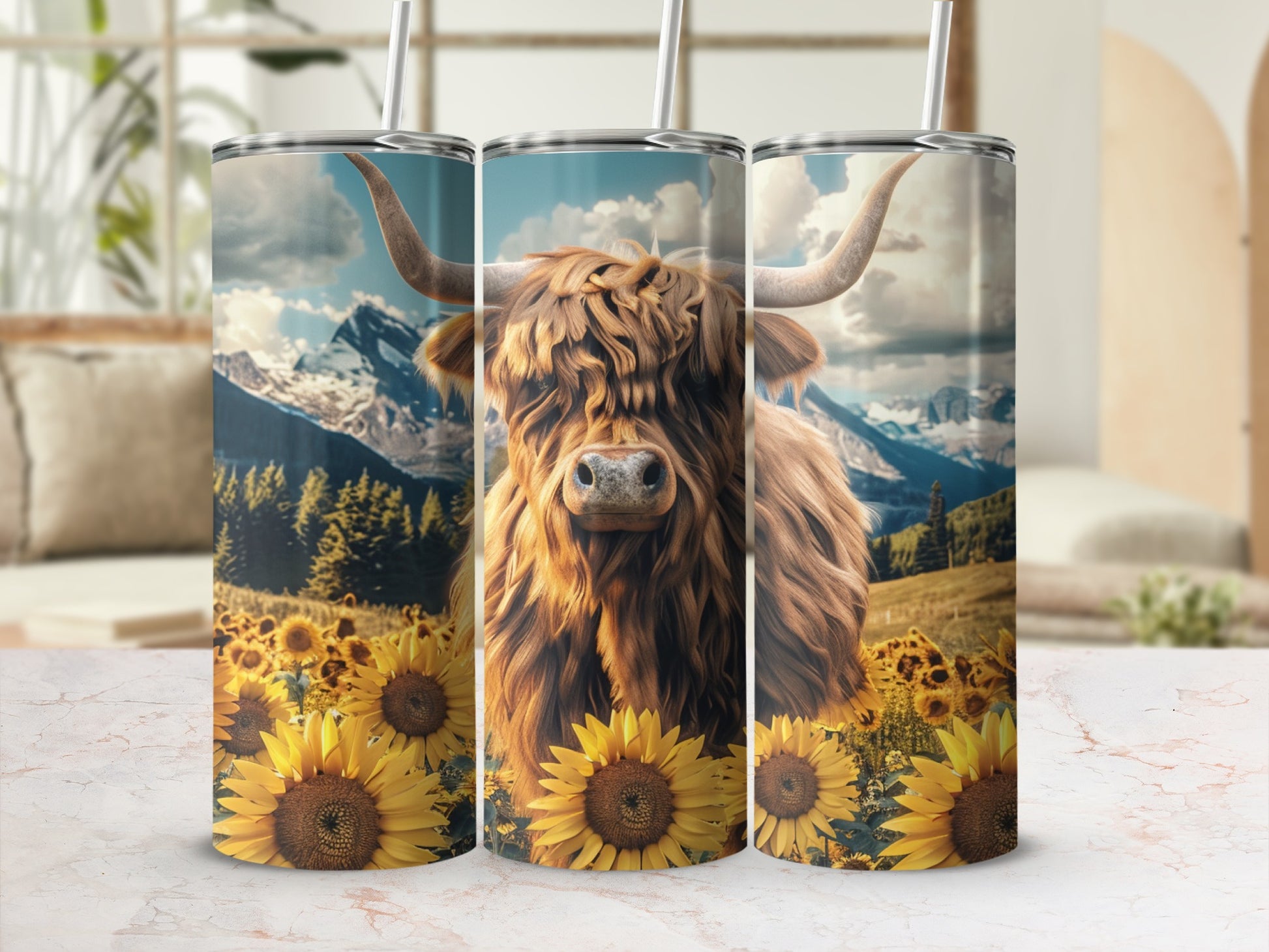 Highland cow in a sunflower field with mountains in the background.