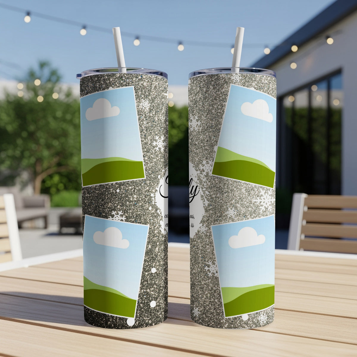 Two glitter tumblers with framed landscape photos and snowflake accents.