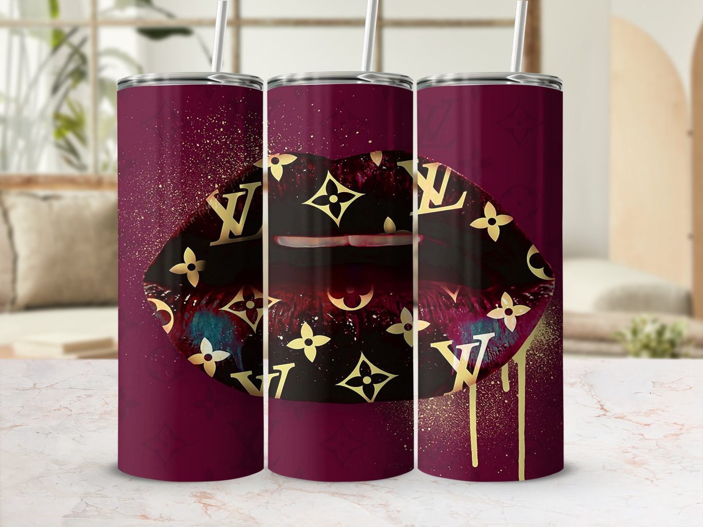 Three tumblers with a dark red design featuring lips, gold LV pattern, and gold drips.