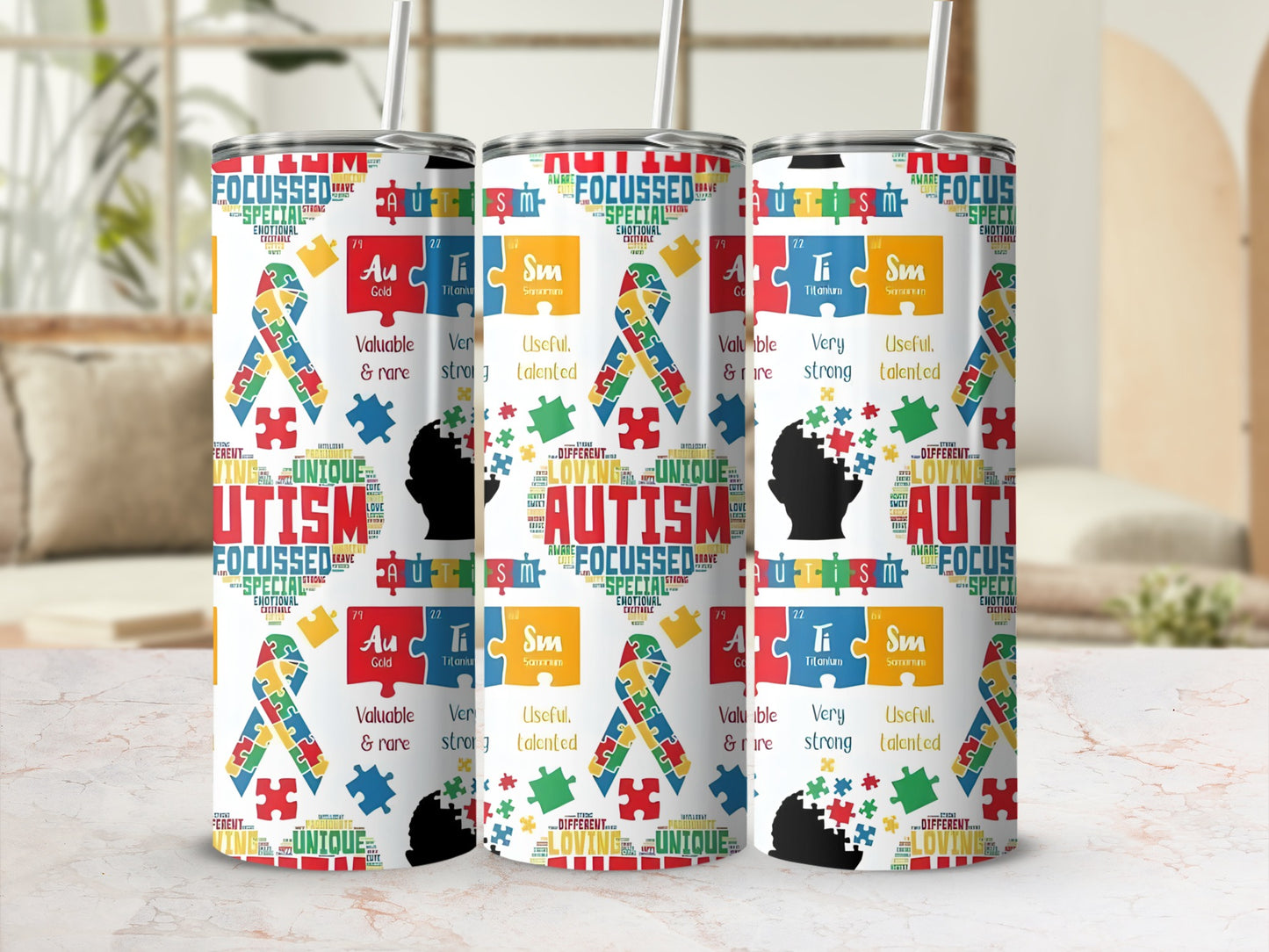 Three tumblers with "Autism" and puzzle ribbon graphics and text.