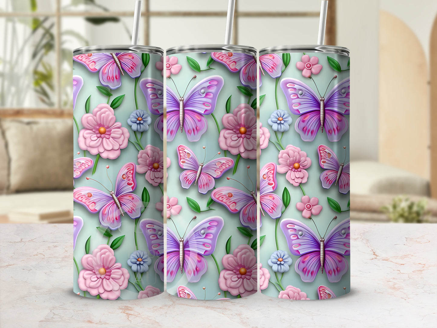 Pink butterflies and flowers adorn a pastel green tumbler.