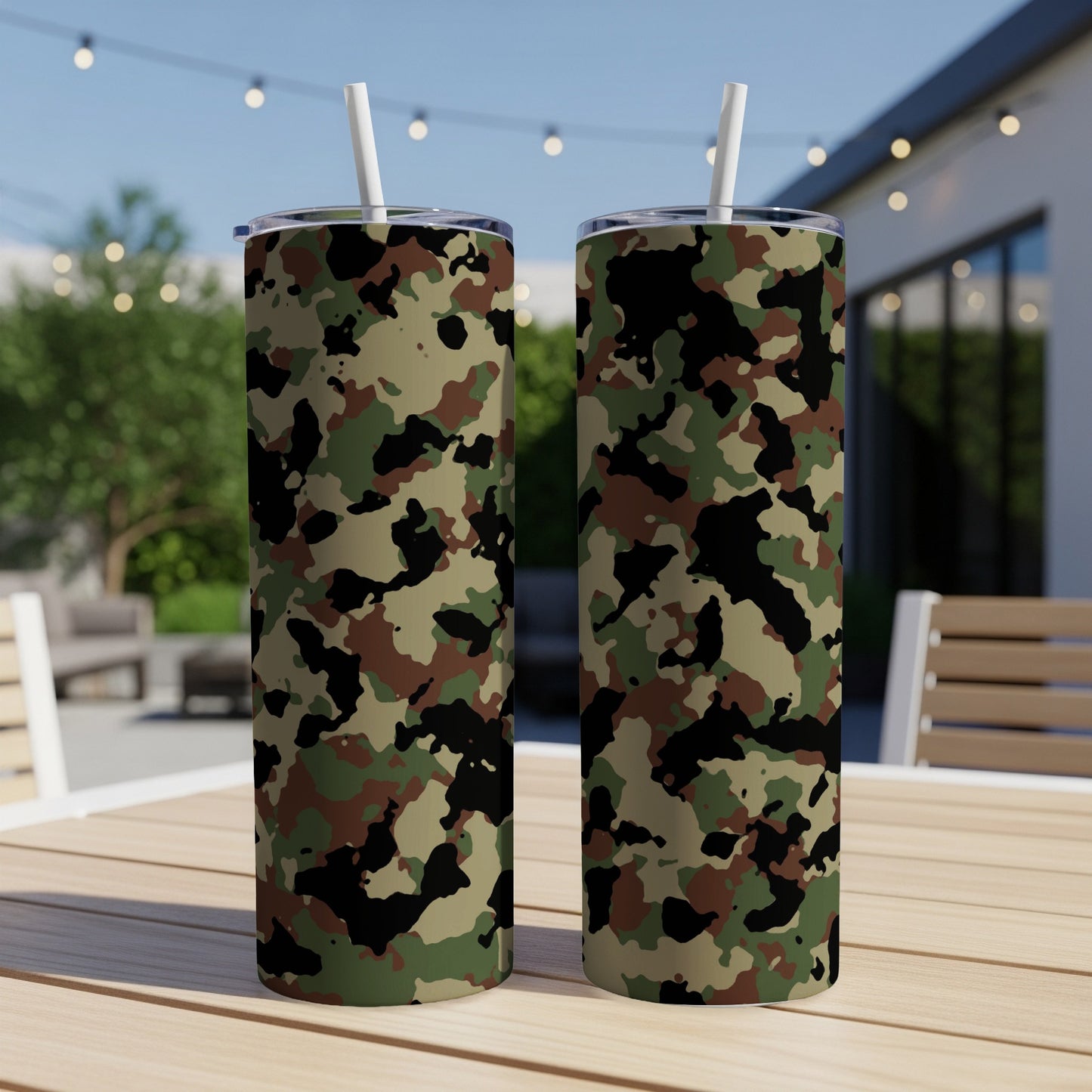 Two tall tumblers with camouflage pattern, complete with white straws.