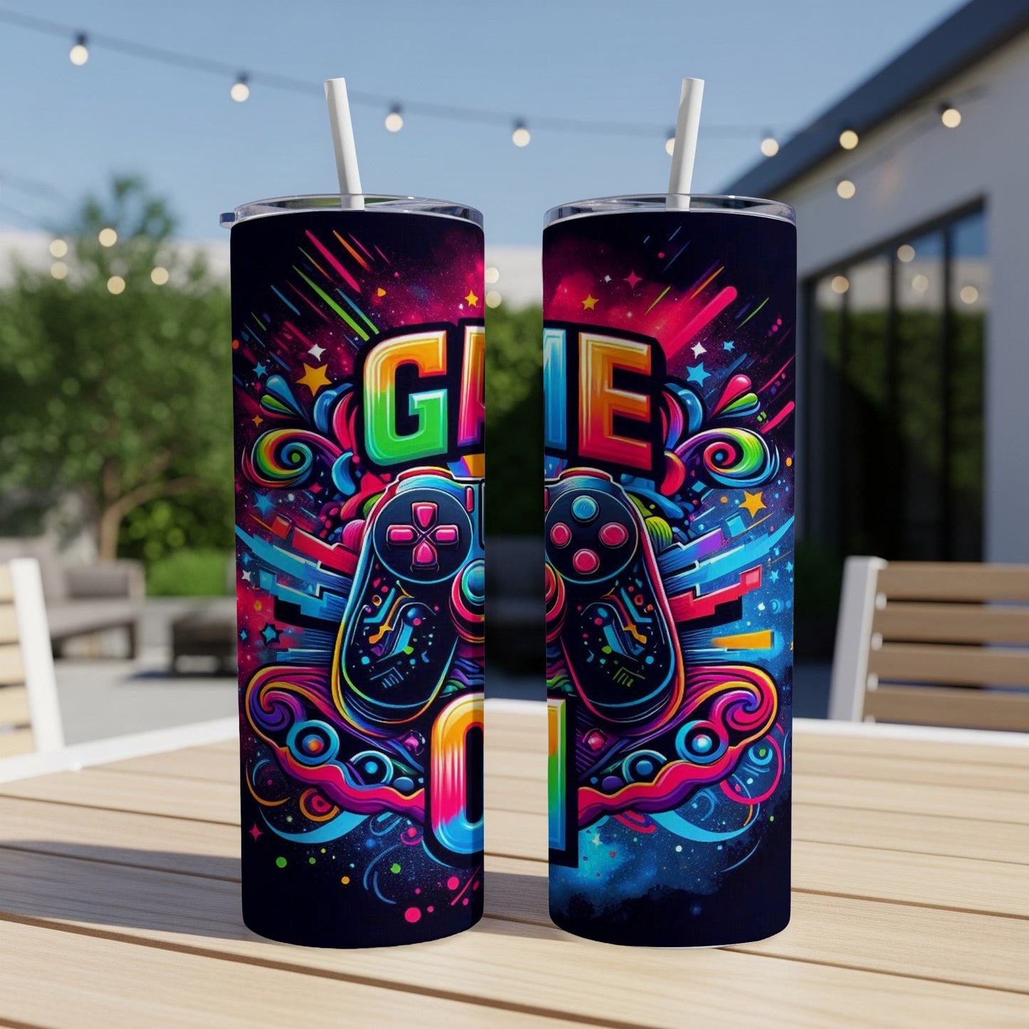 Two colorful tumblers with "GAME ON" text and controller graphics.