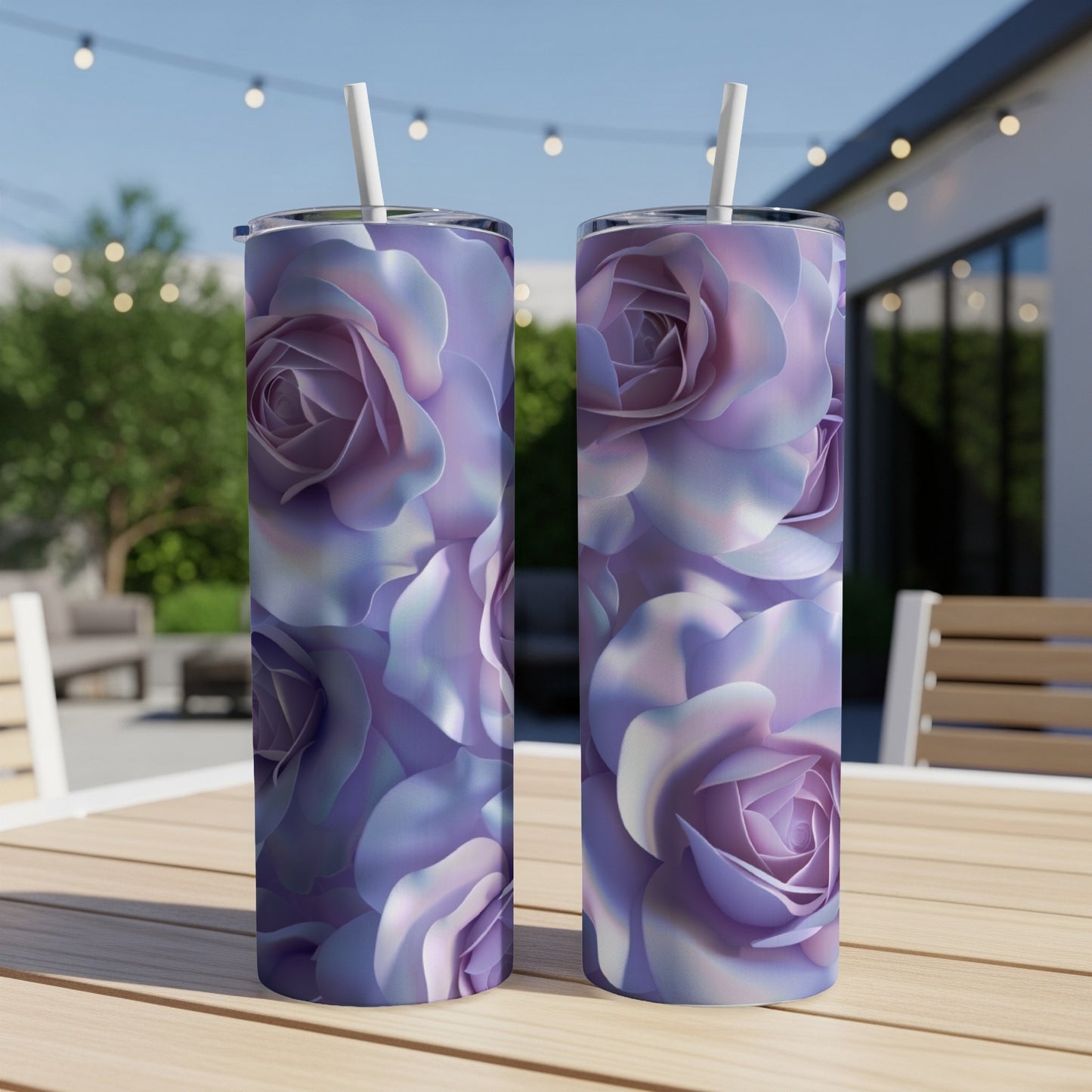 Two tall tumblers with purple rose floral design on a wooden table.