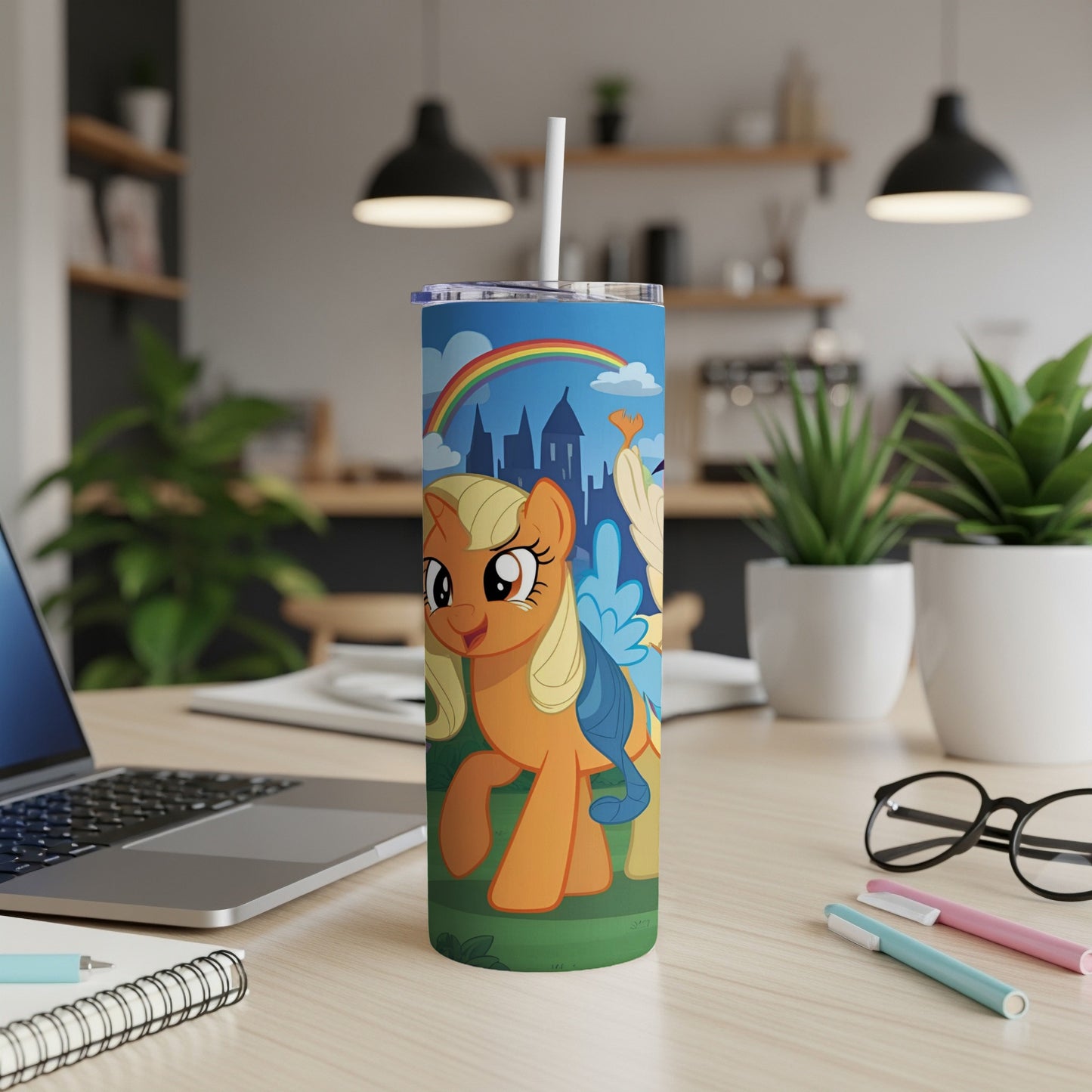 Cartoon pony with rainbow, castle, and clouds on a tumbler.