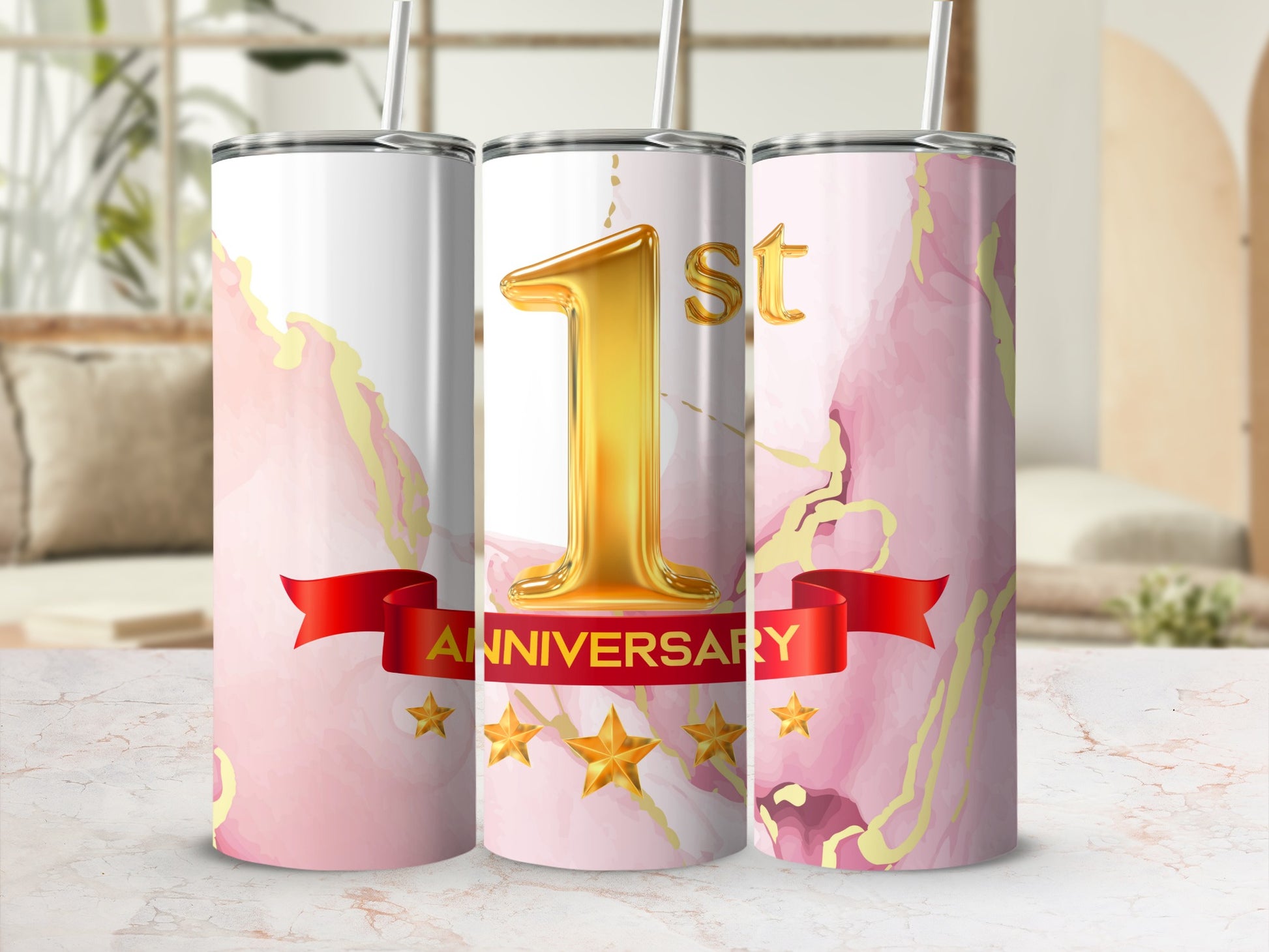 "1st Anniversary" text on a pink marbled tumbler with gold accents.
