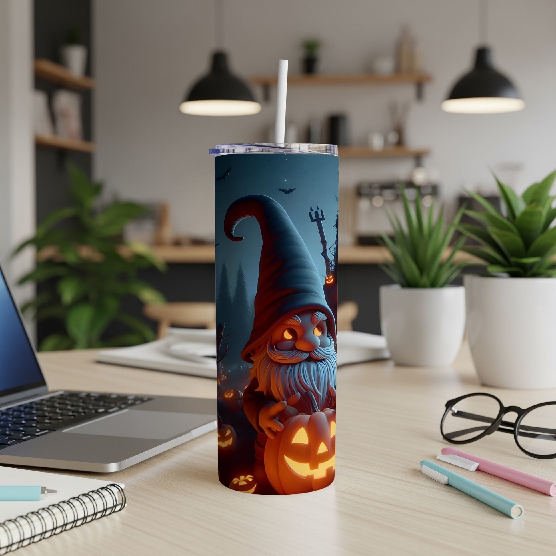Halloween tumbler with a gnome holding a jack-o'-lantern and bats.