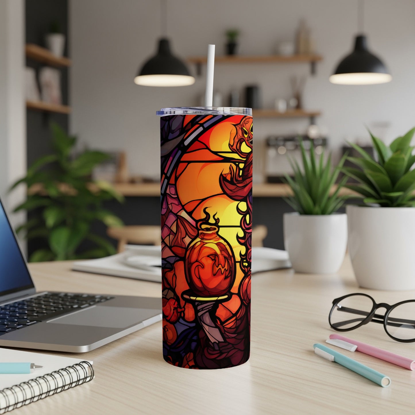 Halloween themed tumbler with stained glass style spooky jack-o'-lantern and potion design.