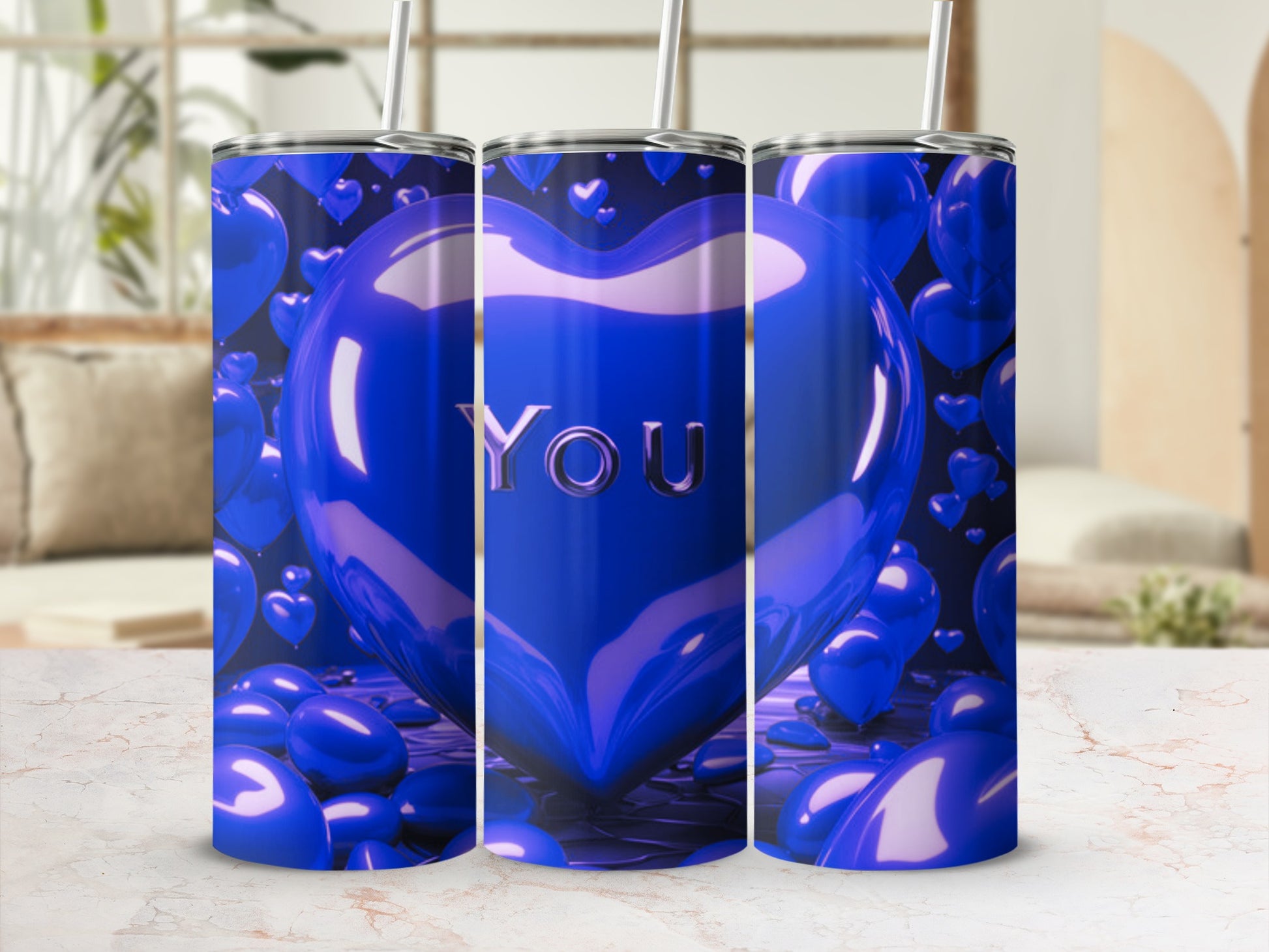 Blue heart-shaped tumbler with "YOU" text, surrounded by smaller hearts.