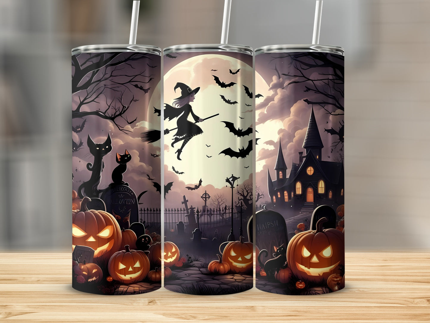 Halloween themed tumbler with witch, bats, pumpkins, black cats, and haunted house.