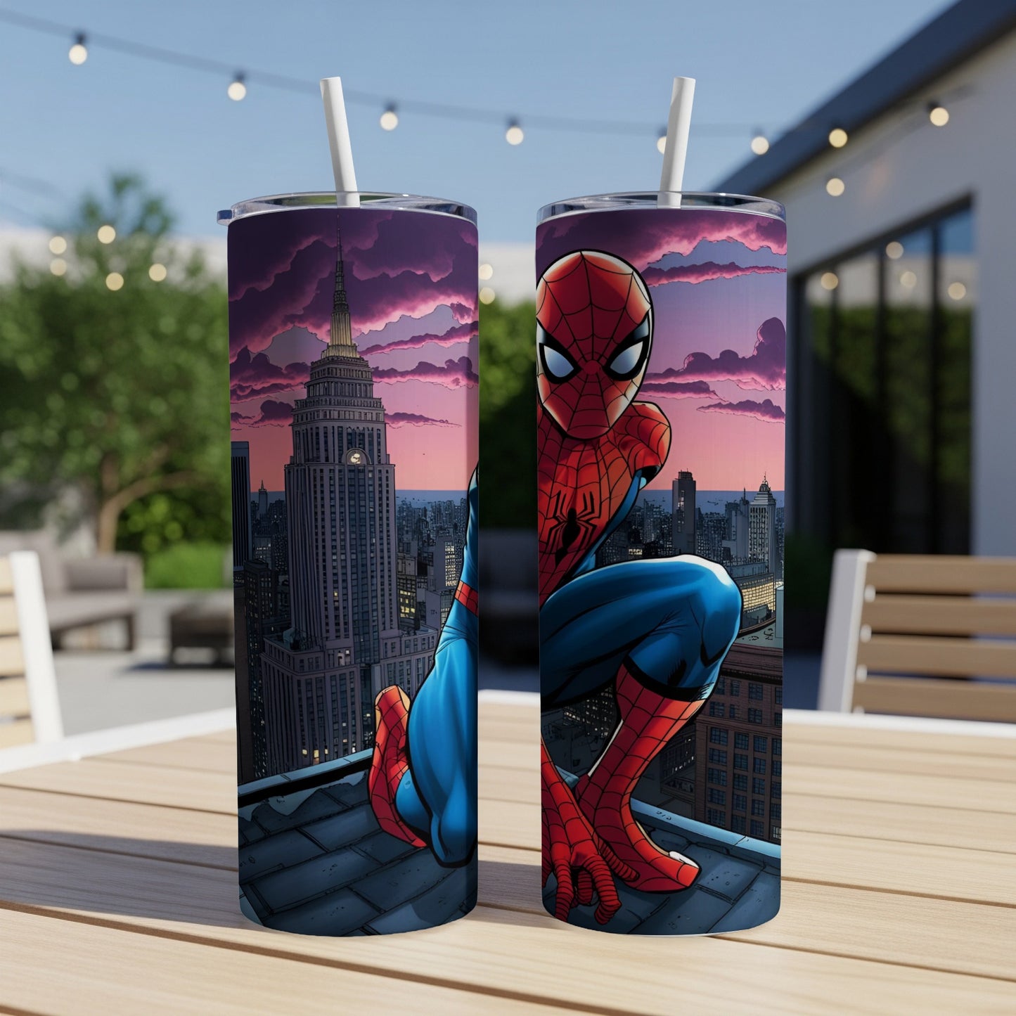 Spider-Man crouches on a rooftop with the Empire State Building in the background.