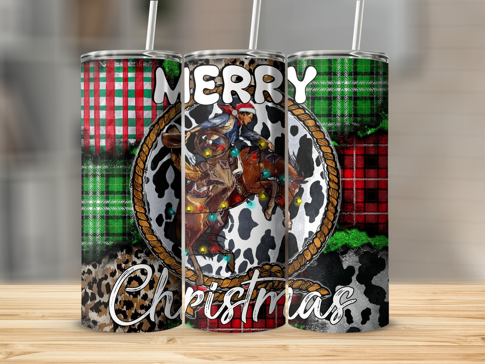 Tumbler with cowboy on horse, Merry Christmas text, and plaid/animal print patterns.