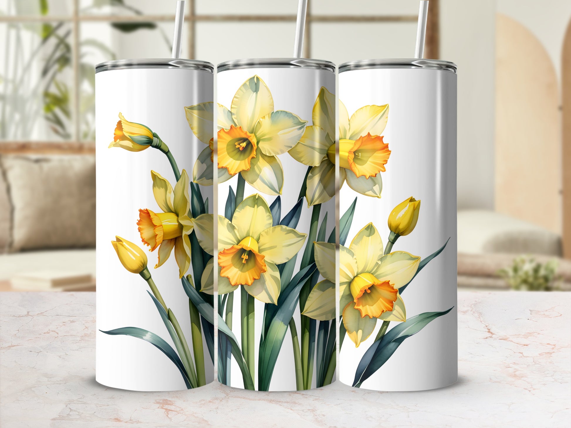 Three white tumblers with a floral daffodil design.