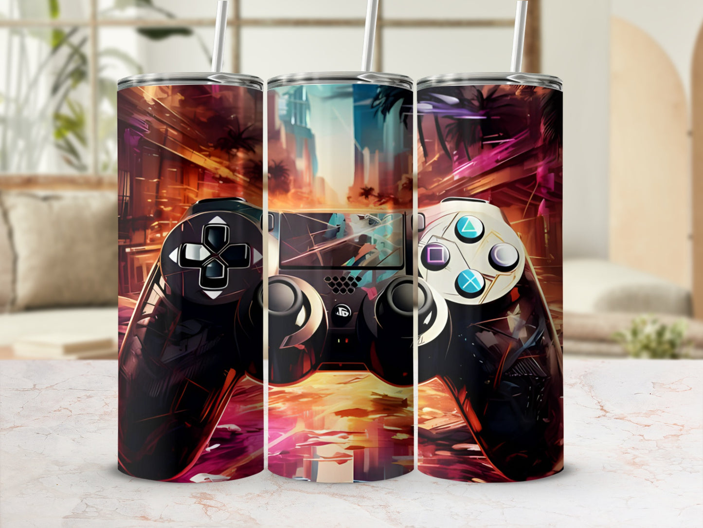 Gamer controller design on three tall, slim tumblers with straw holes.