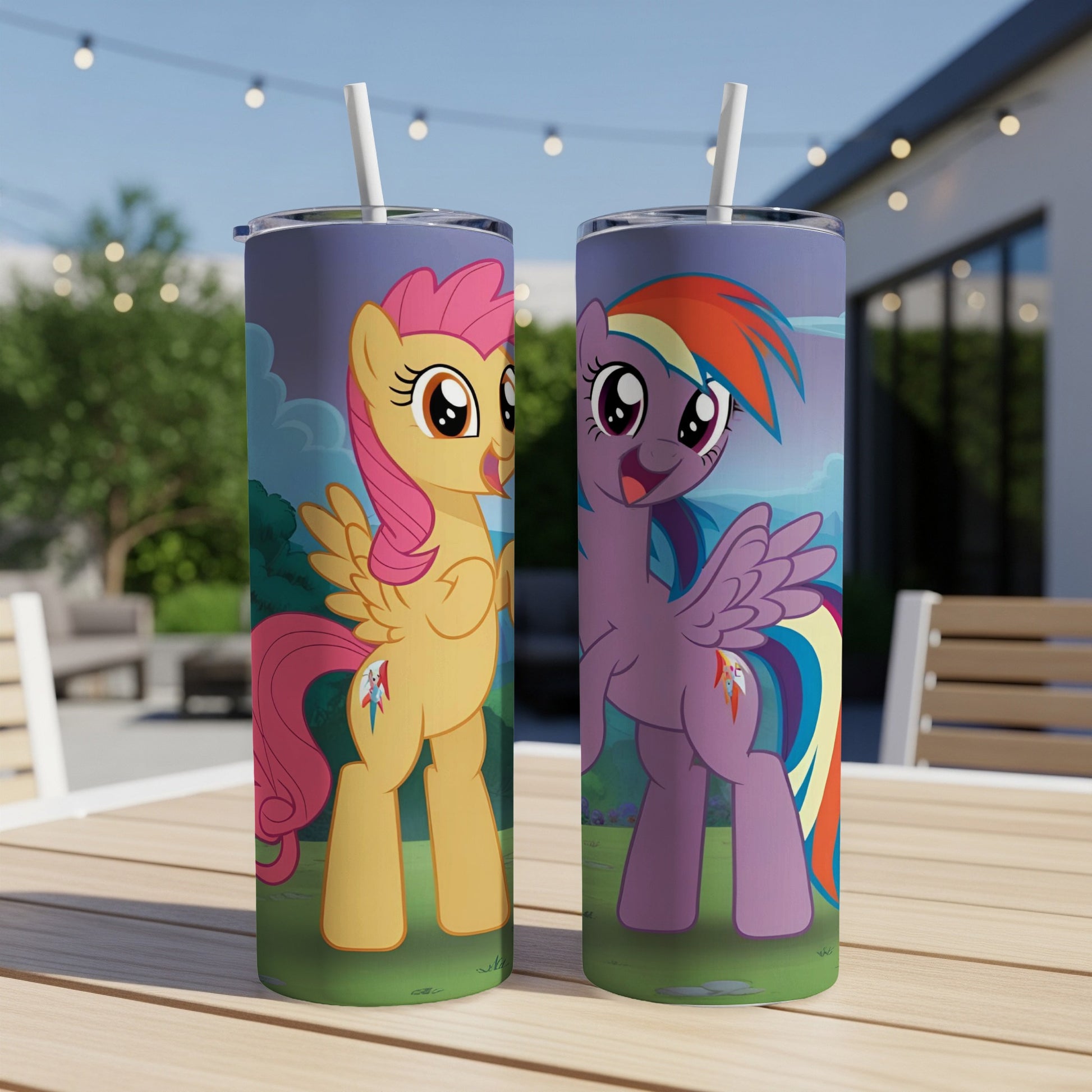 Two My Little Pony tumblers featuring Rainbow Dash and Fluttershy on a table.