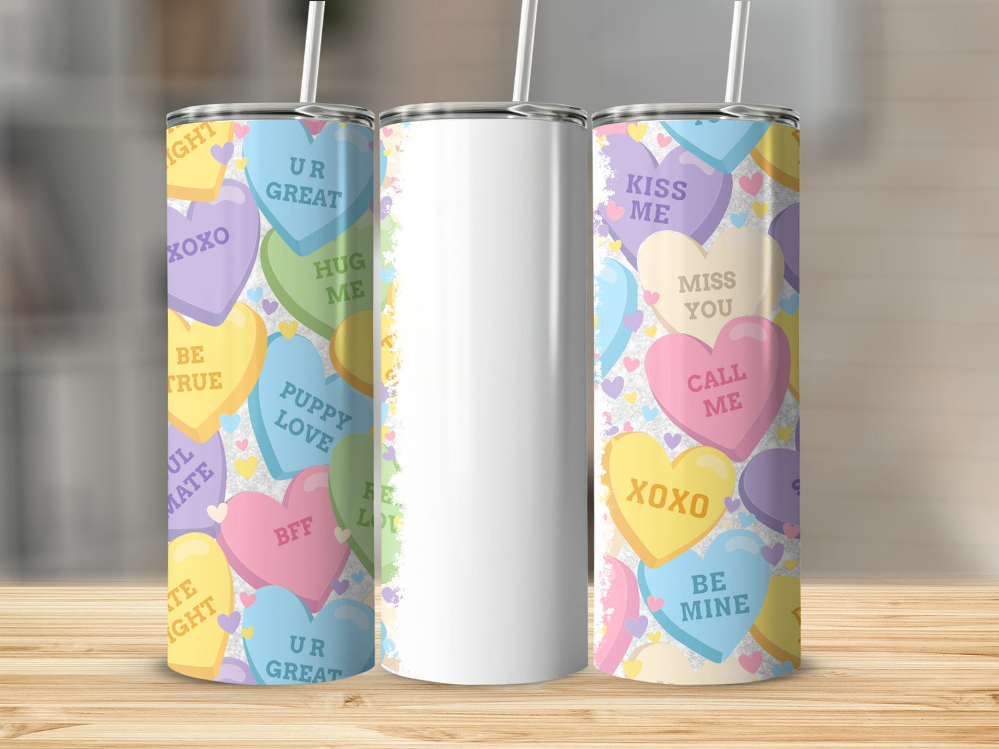 White tumbler with Valentine's Day candy heart designs and text.