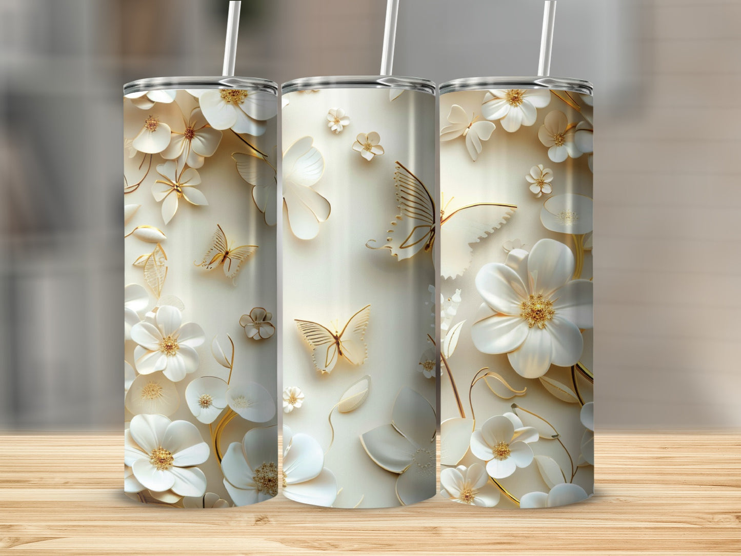 Three white tumblers with embossed floral and butterfly designs.