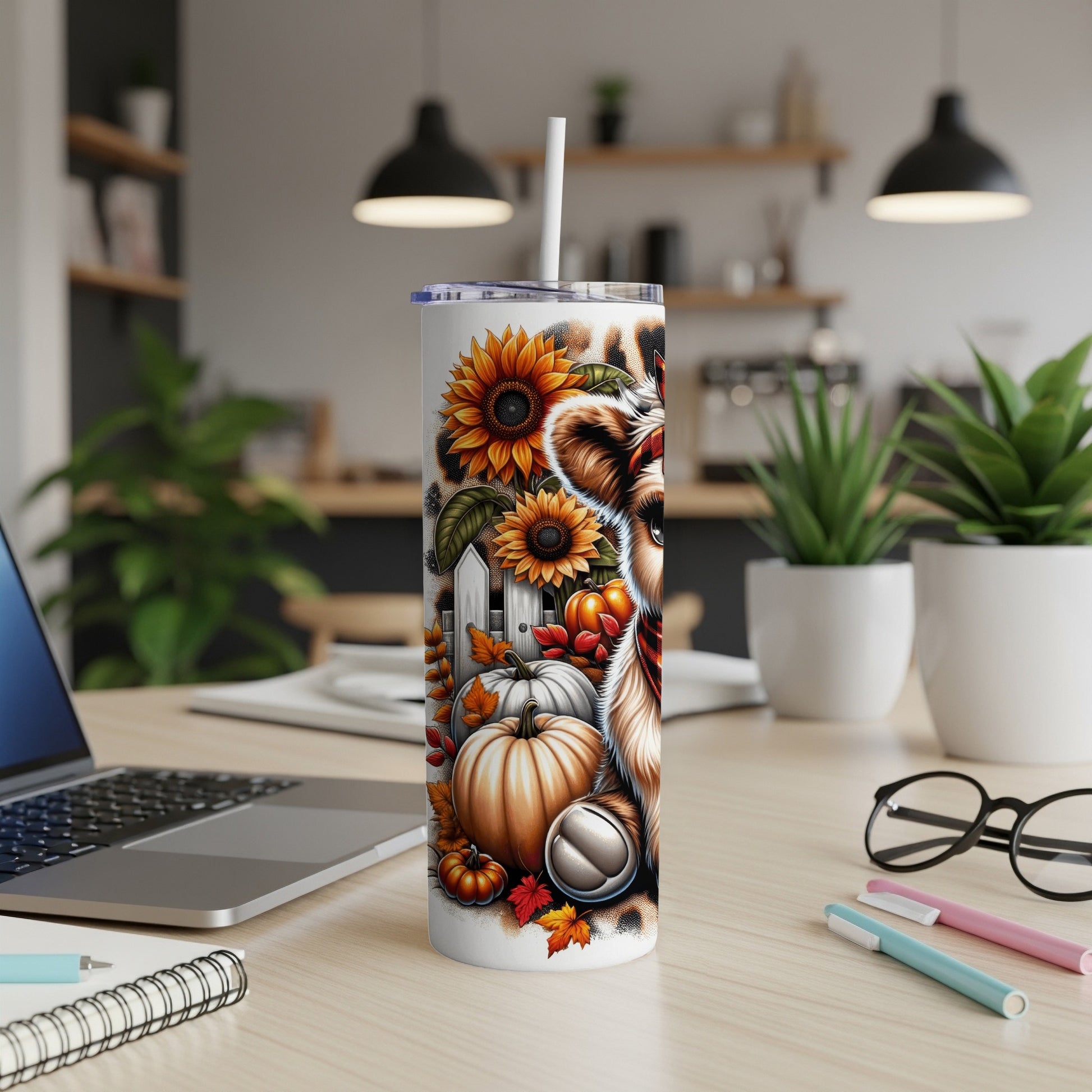 Tumbler with sunflowers, pumpkins, and a playful dog face with leopard spots.