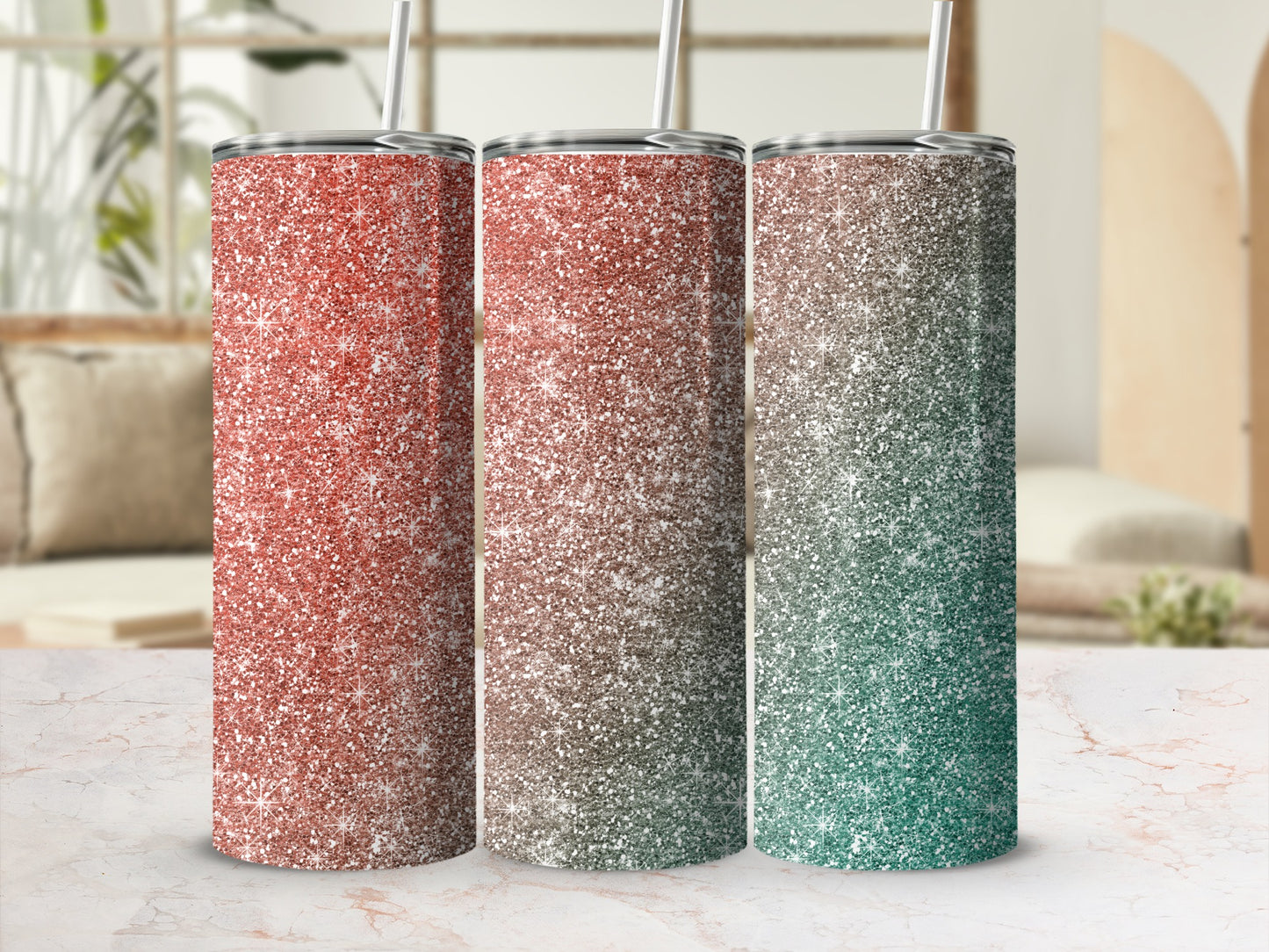 Three glitter tumblers with straws showing ombre effects of coral, brown, and green.