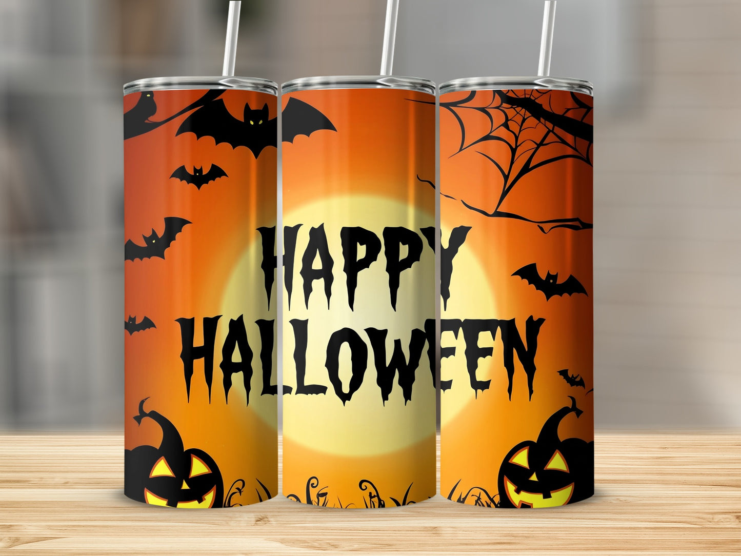 Three tumblers with a "Happy Halloween" design featuring bats, pumpkins, and a full moon.