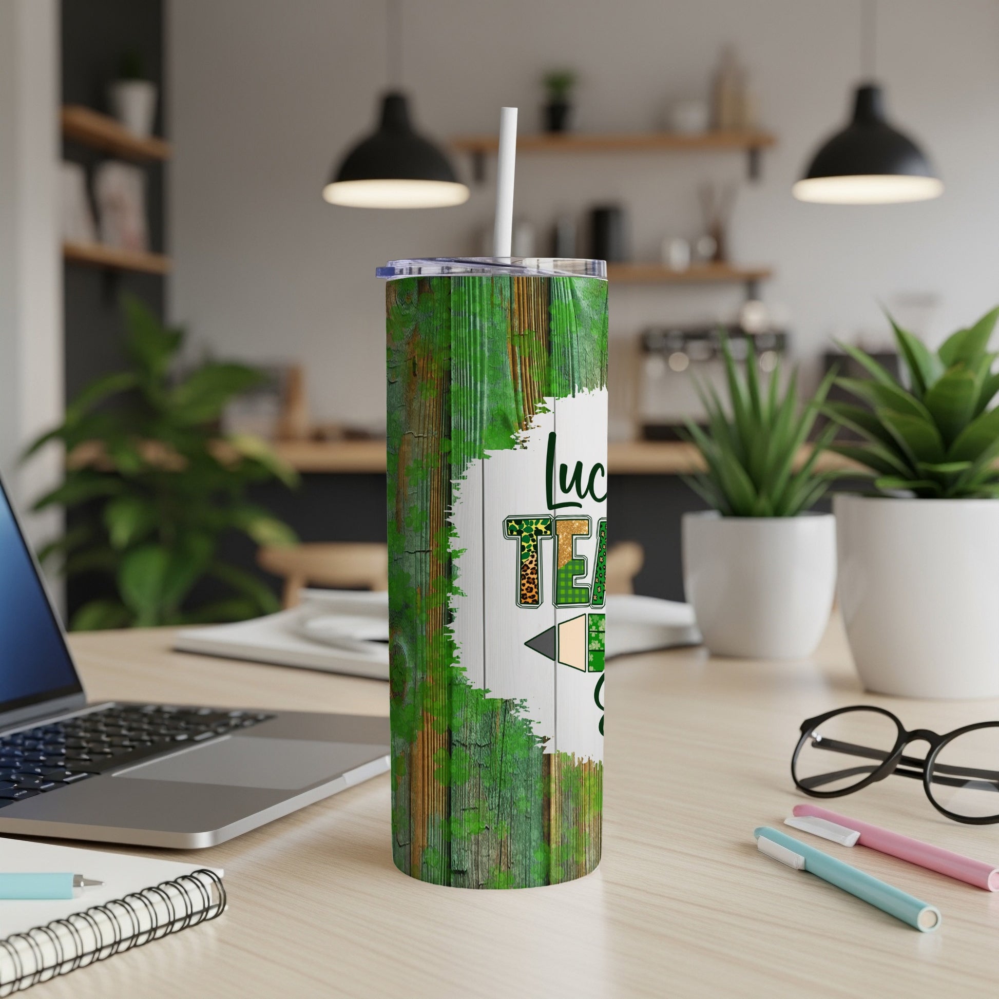 Green wood grain tumbler with "Lucky Teacher" text and pencil graphic.