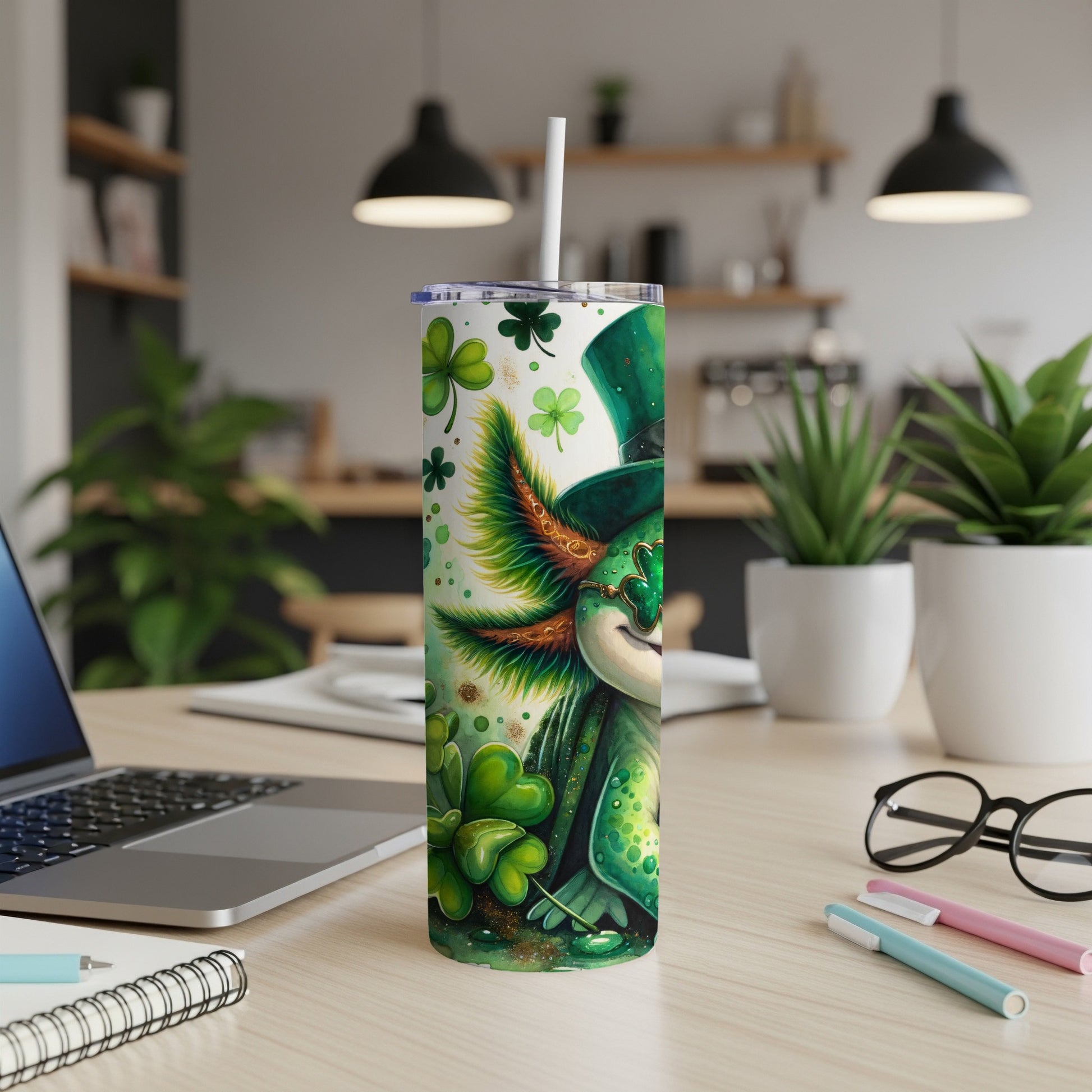 Leprechaun tumbler with shamrocks and a straw.