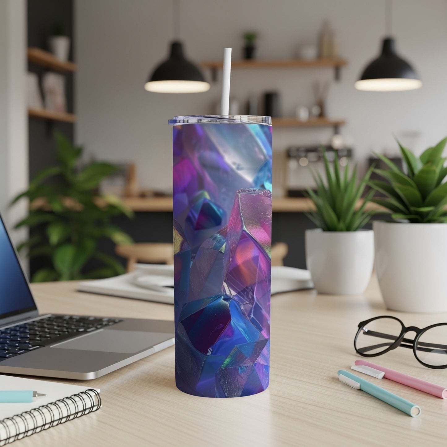 Tumbler with a faceted, iridescent purple and blue gem-like design.