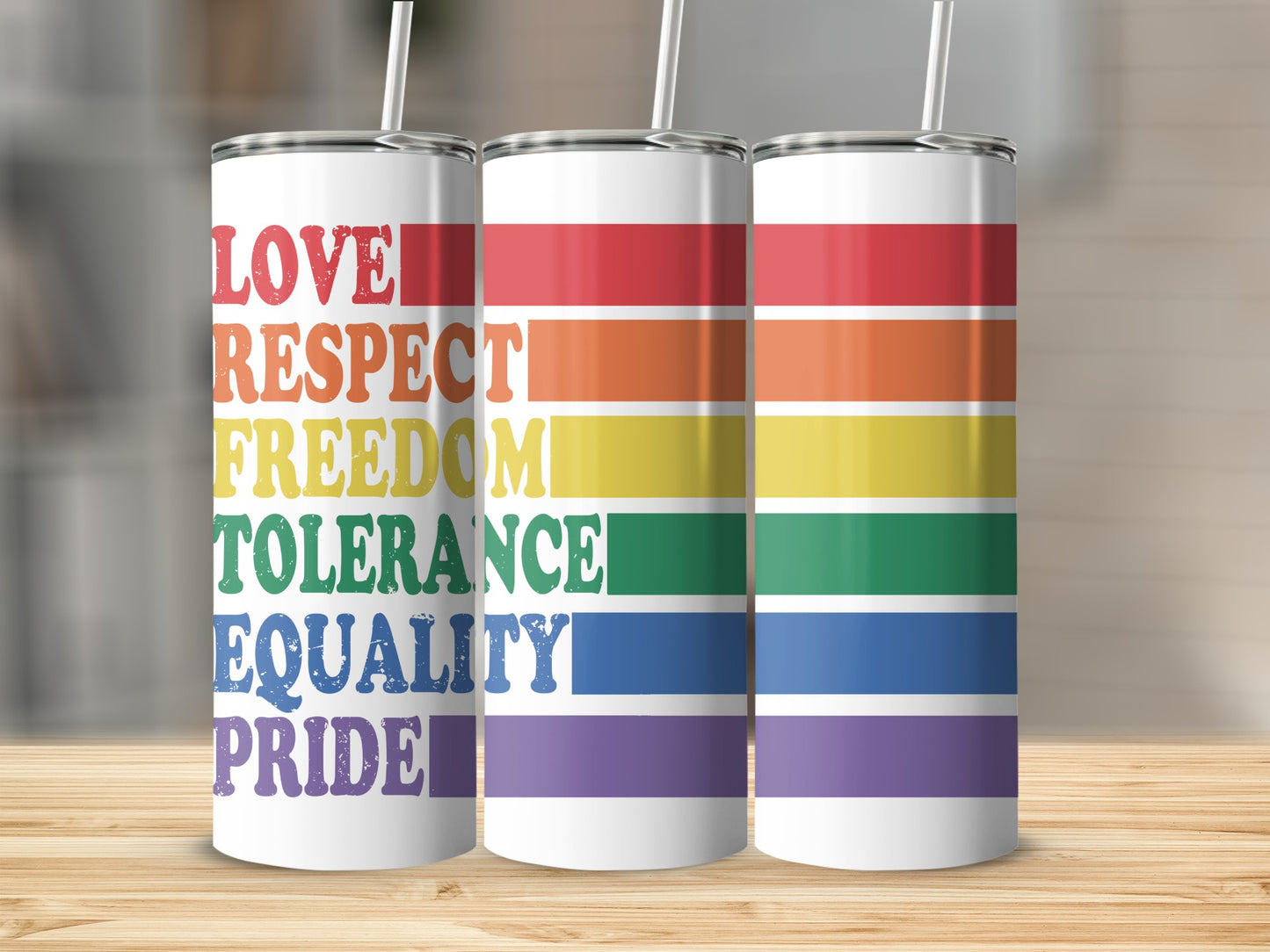 Three tumblers with rainbow stripes and text reading "LOVE RESPECT FREEDOM TOLERANCE EQUALITY PRIDE."