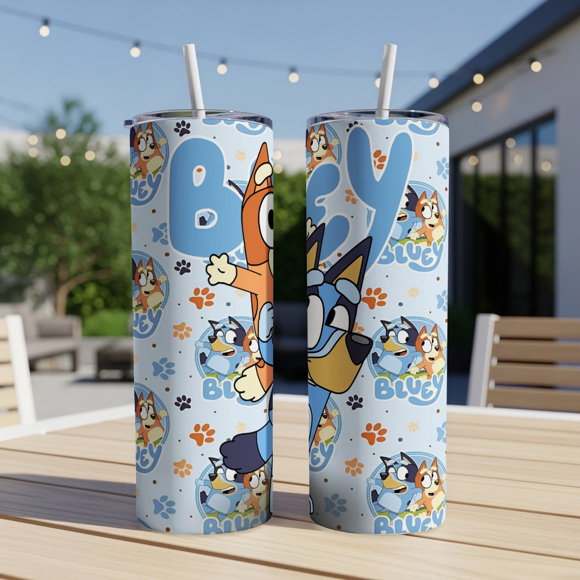 Bluey characters on a light blue patterned insulated tumbler with a straw.