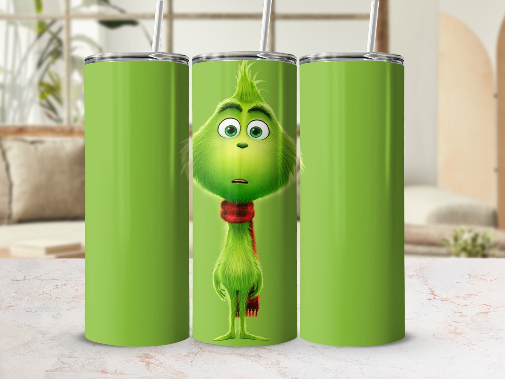 Grinch with red scarf on green tumbler, a vertical design.