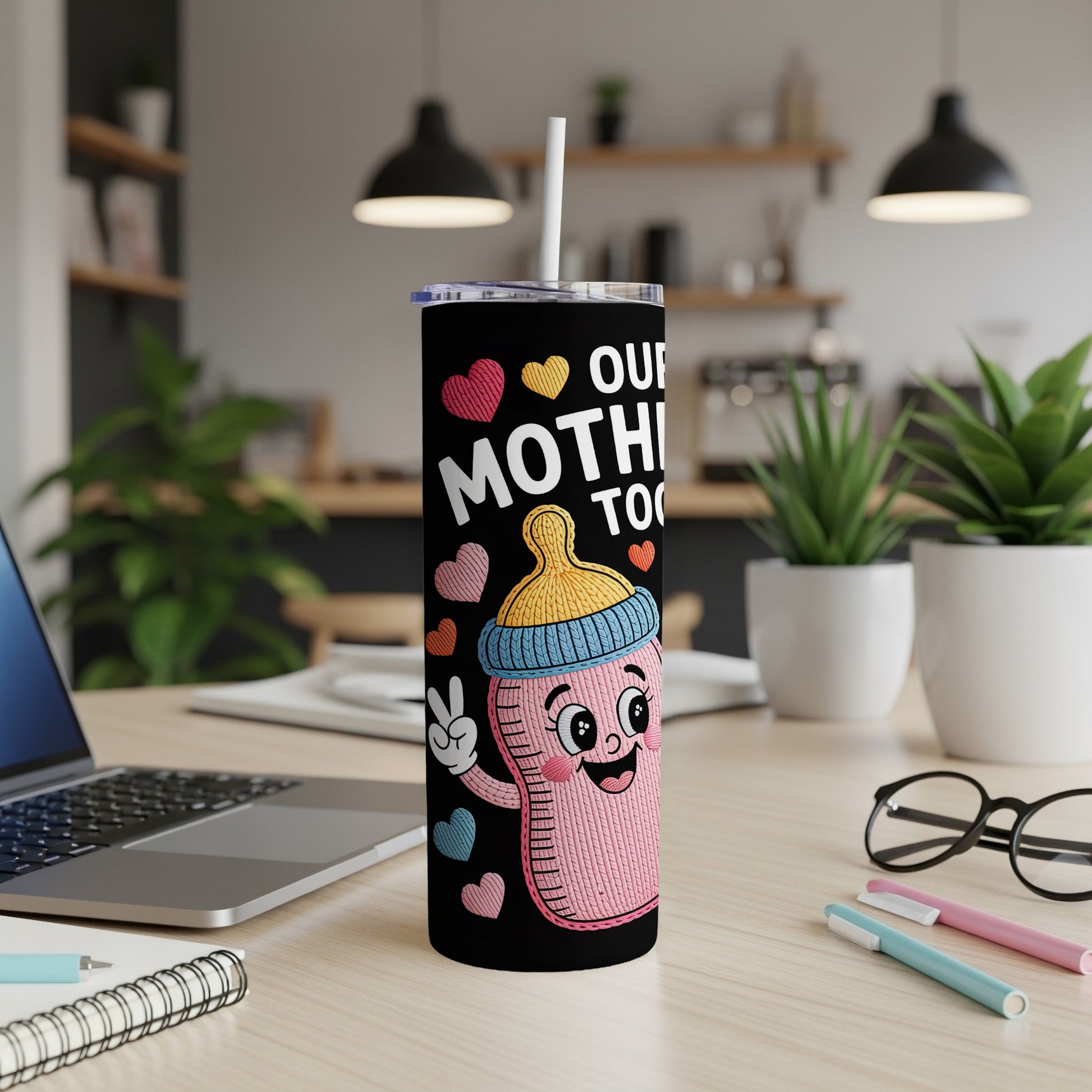 Pink baby bottle with colorful hearts and text "OUR MOTHER TOO".