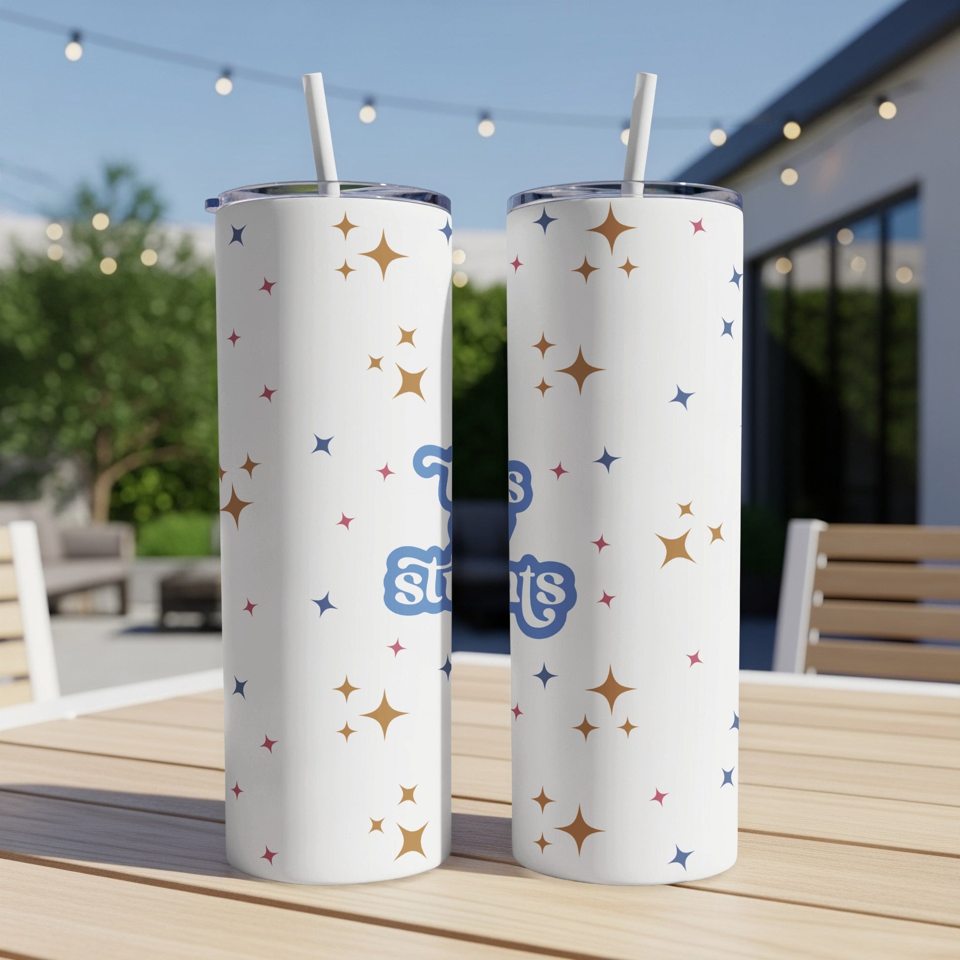 Two white tumblers with colorful star pattern and text "Tuesdays are for tacos".