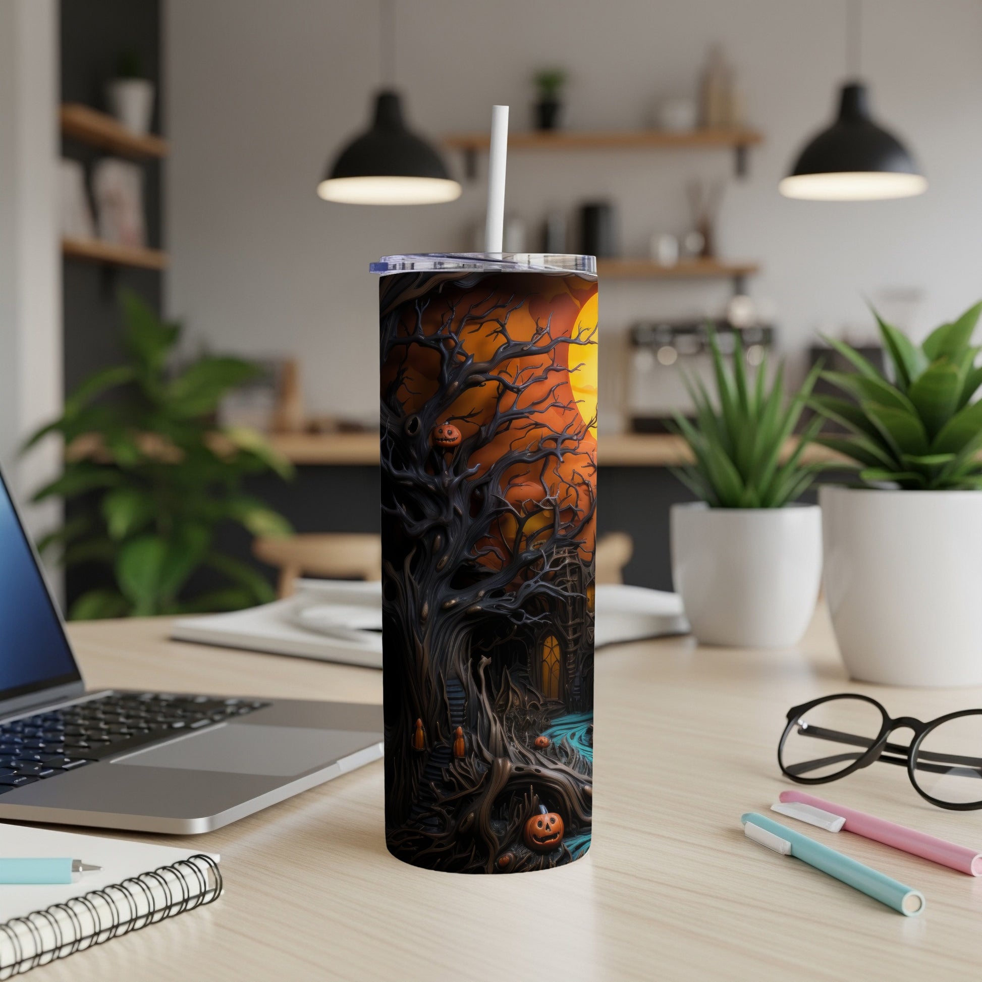 Tall tumbler with a spooky Halloween tree, pumpkins, and a haunted house design.