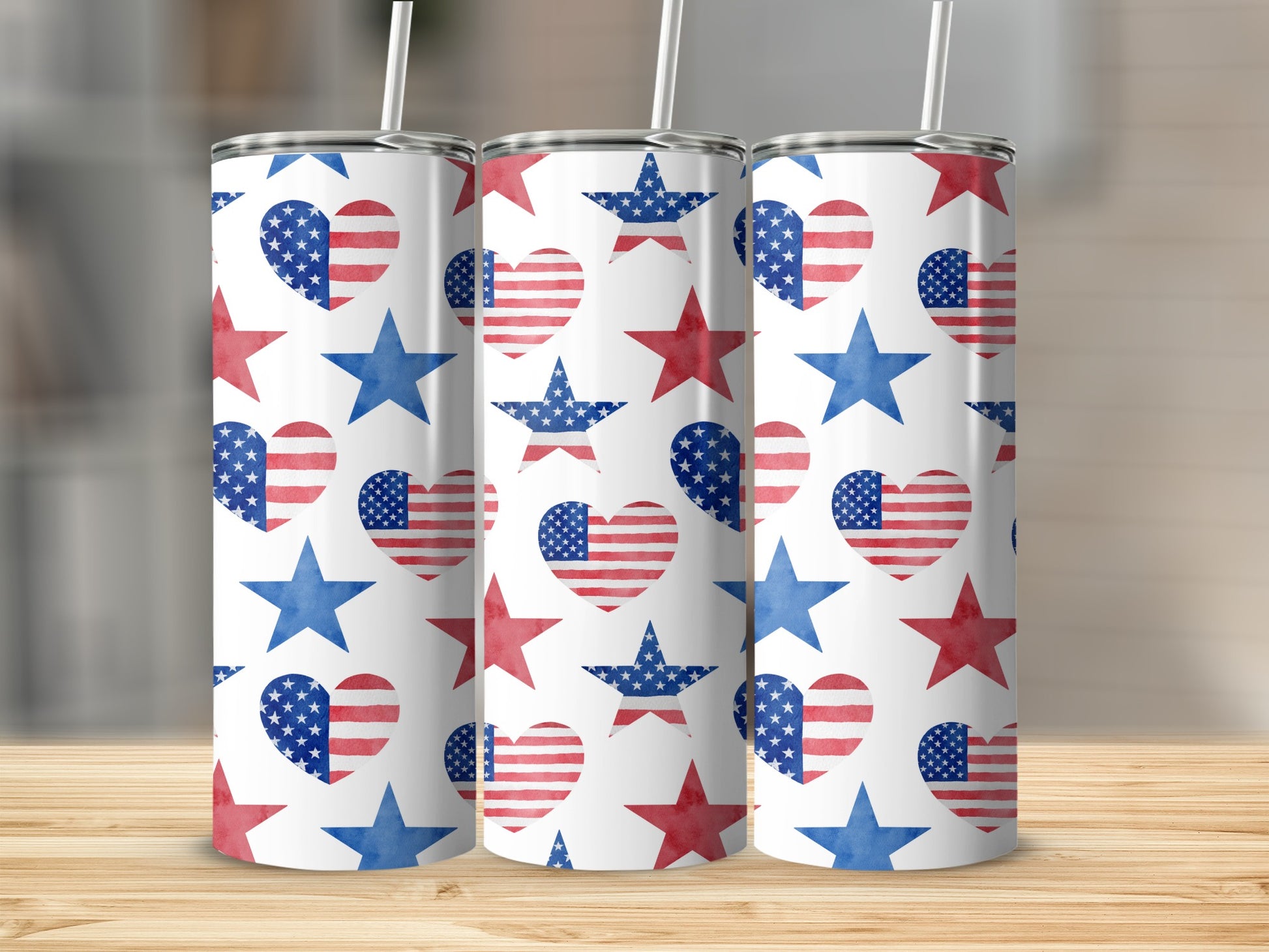 Three tumblers with a white background featuring American flag heart and star patterns.