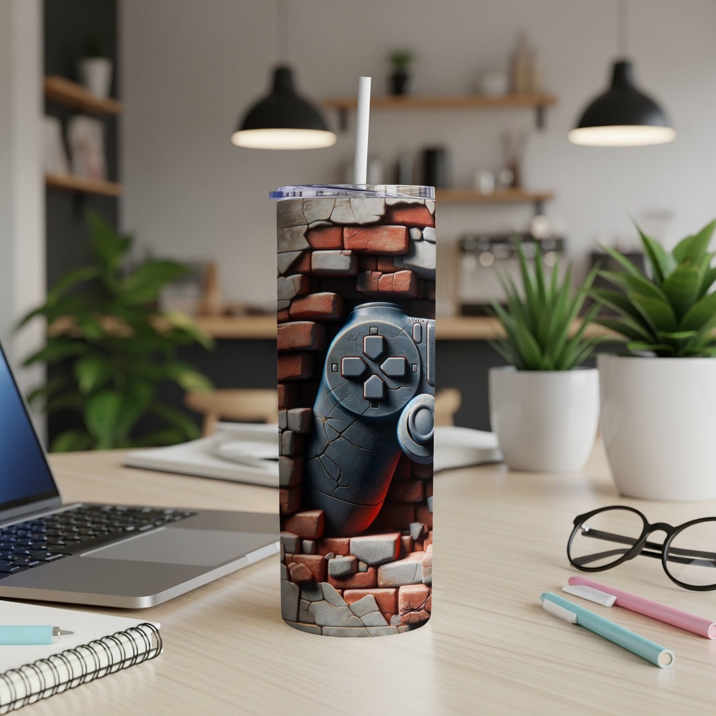 Gaming controller breaking through a brick wall design on a tumbler.