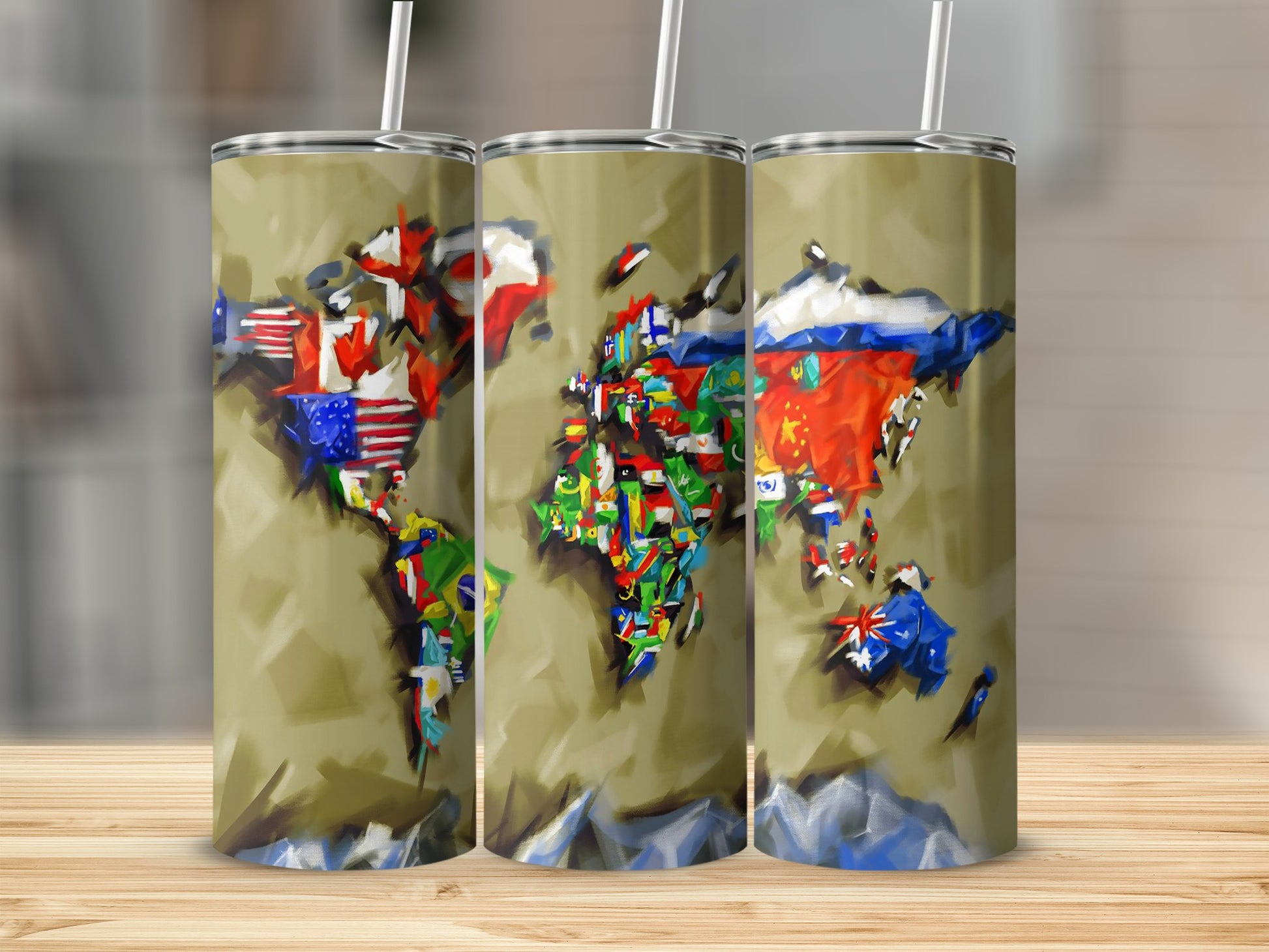 Three metal tumblers with a world map graphic composed of national flags.