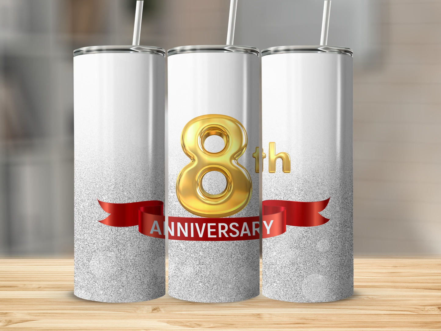 Three white tumblers with glitter and a gold 8th anniversary ribbon.