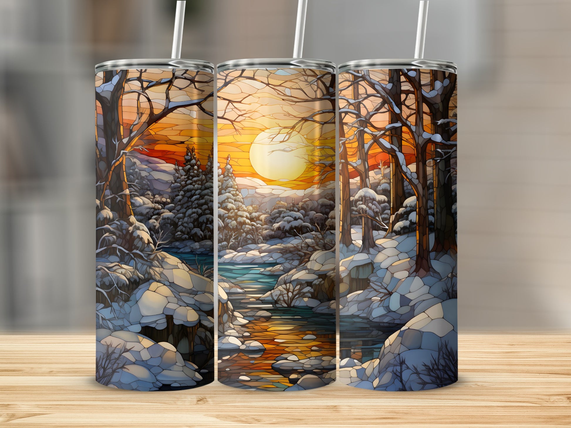 Three tumblers with a vibrant winter sunset forest scene wrap-around design.