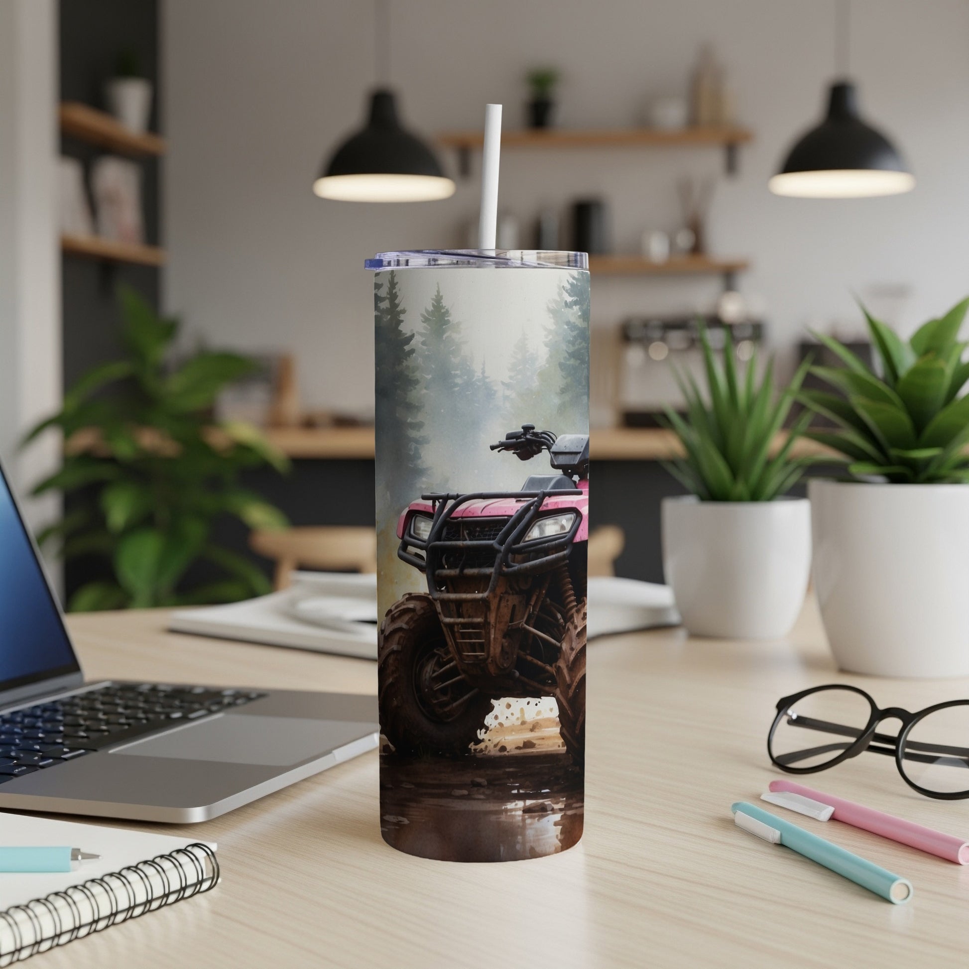 Pink ATV with muddy tires in a forest scene on a tumbler.