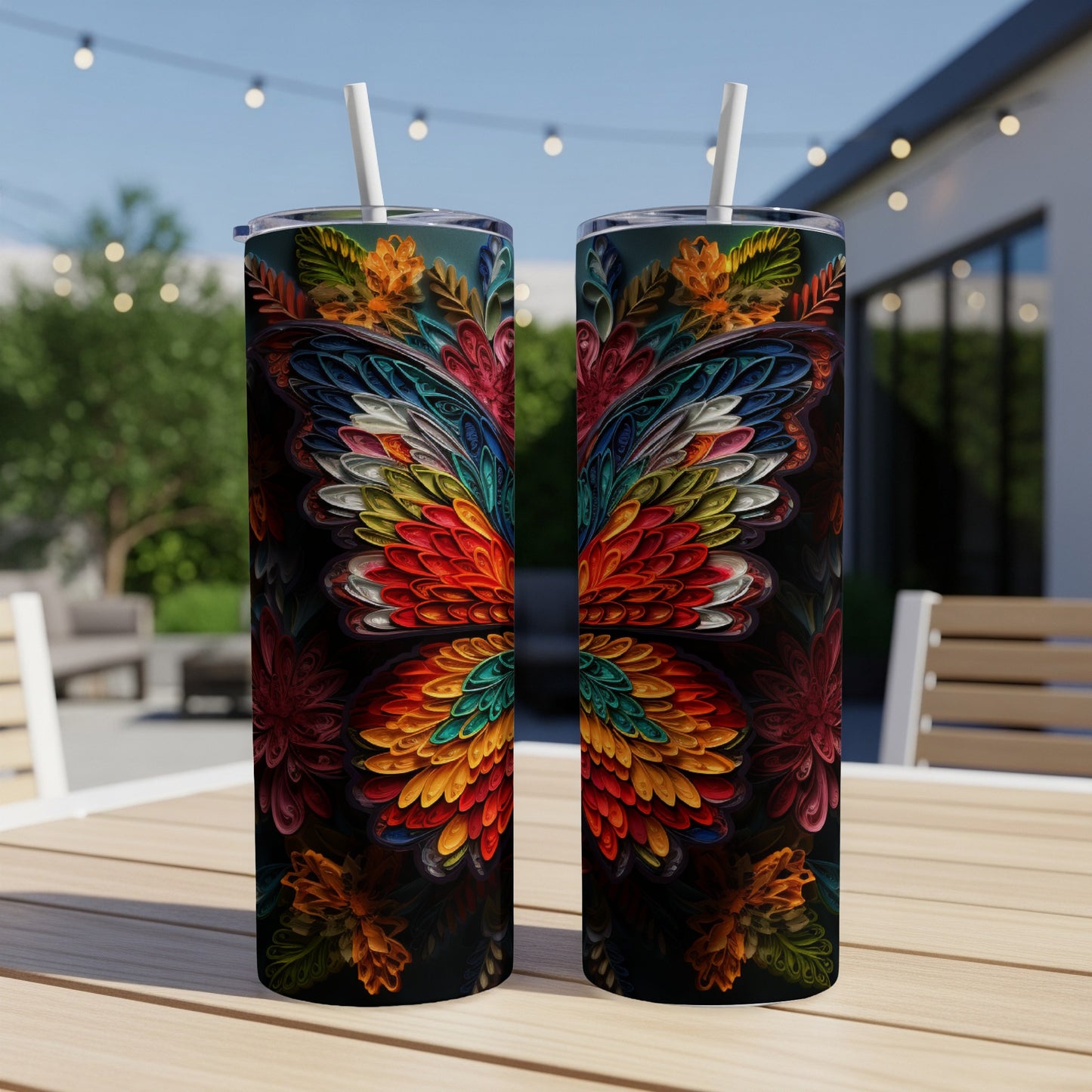Two tumblers with vibrant, symmetrical butterfly wing designs.