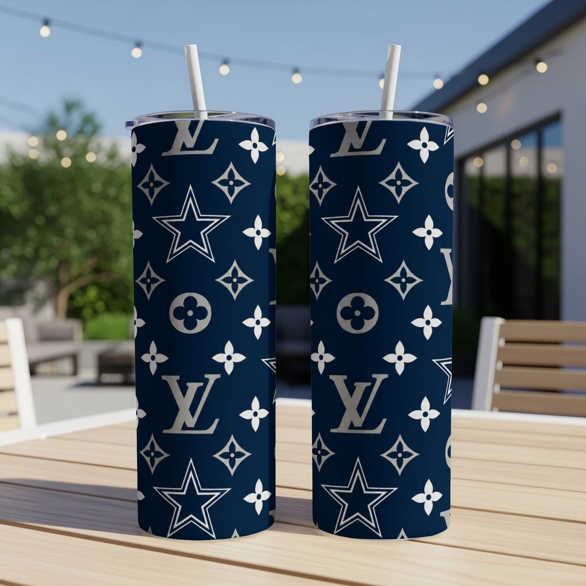 Two navy blue tumblers with white Dallas Cowboys stars and LV-inspired pattern.