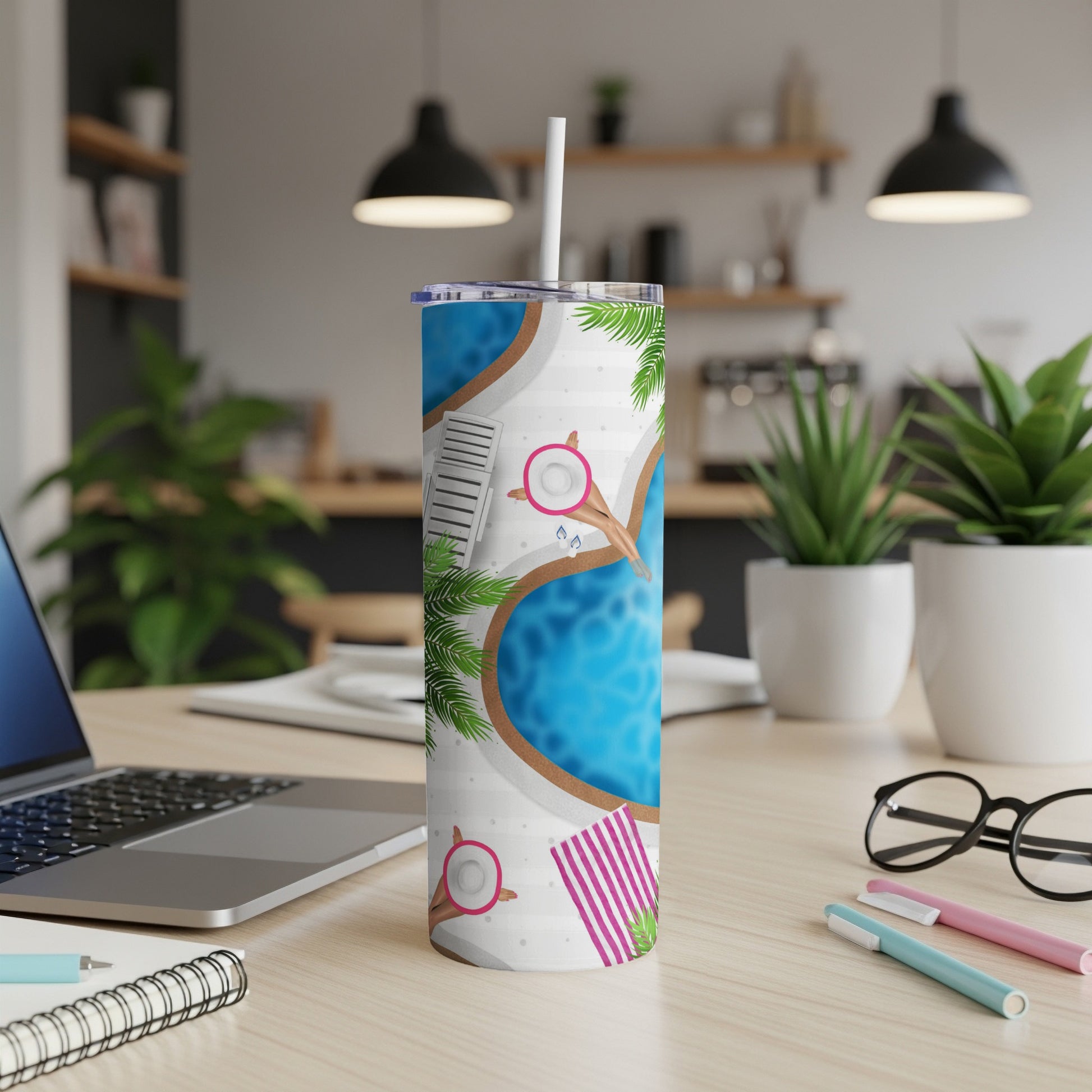 White tumbler with tropical pool design and palm leaves.