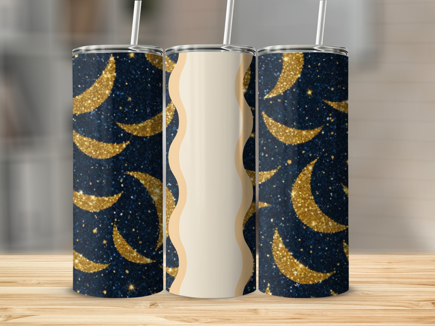 Three tumblers with navy backgrounds and glittering gold crescent moons.