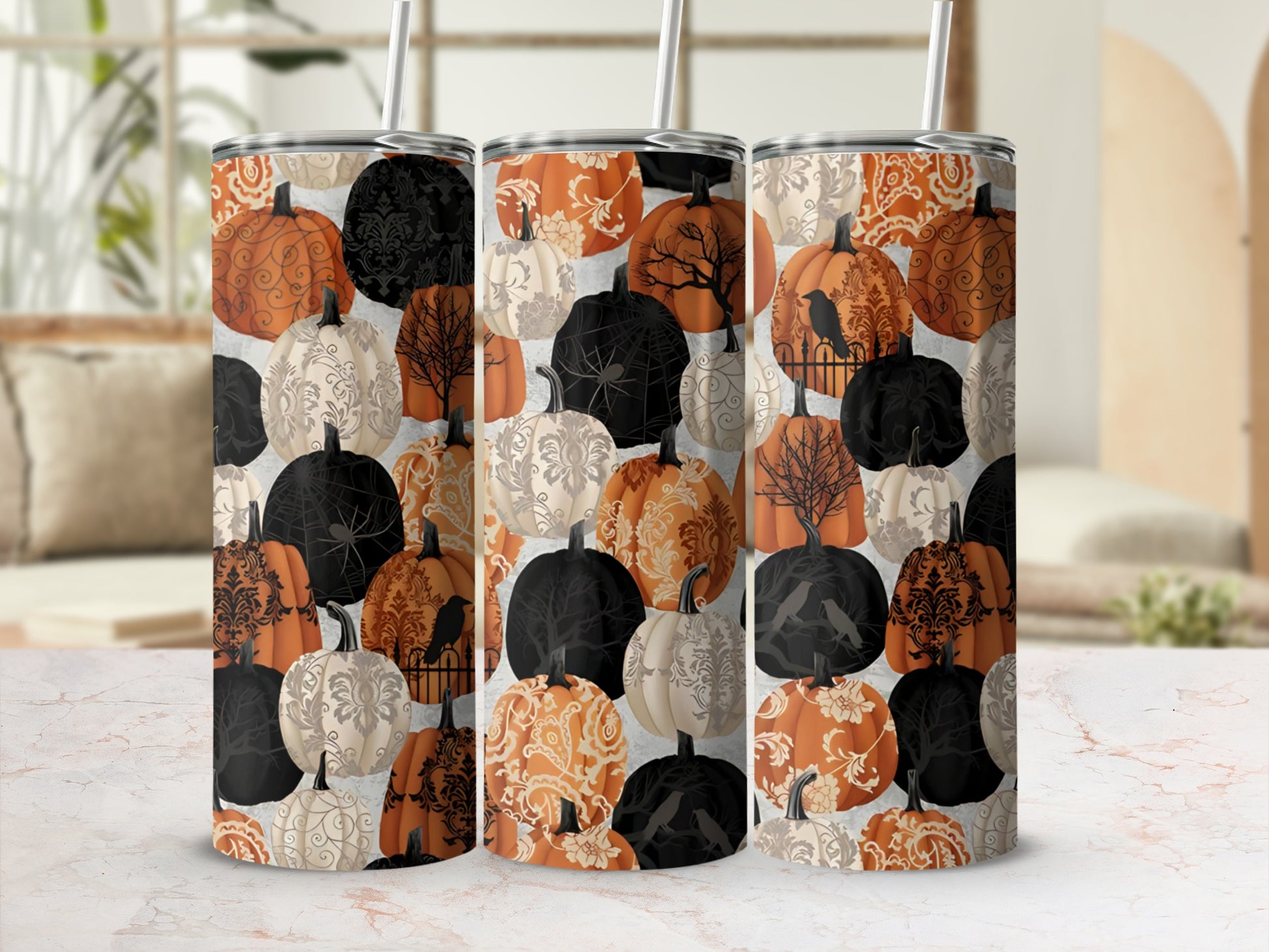 Three tumblers with a Halloween pumpkin and crow pattern.