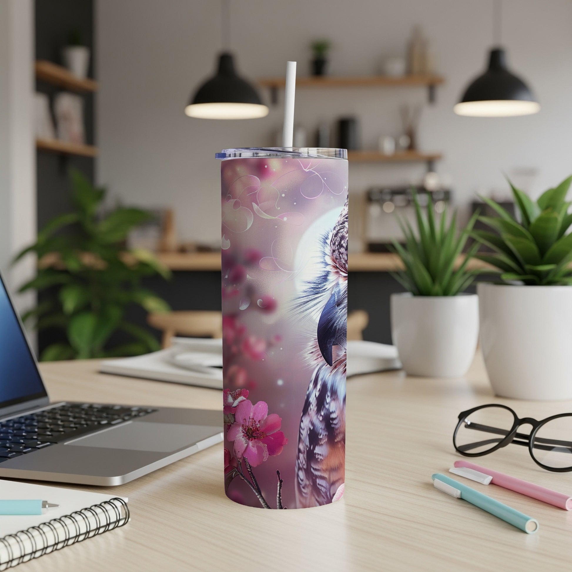 Owl illustration on a skinny tumbler with cherry blossoms.
