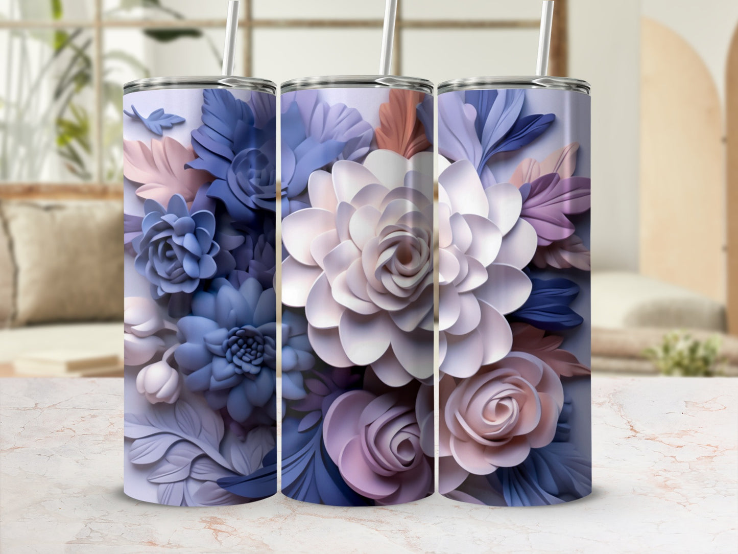 Purple, pink, and blue floral arrangement on a tall tumbler with straw.